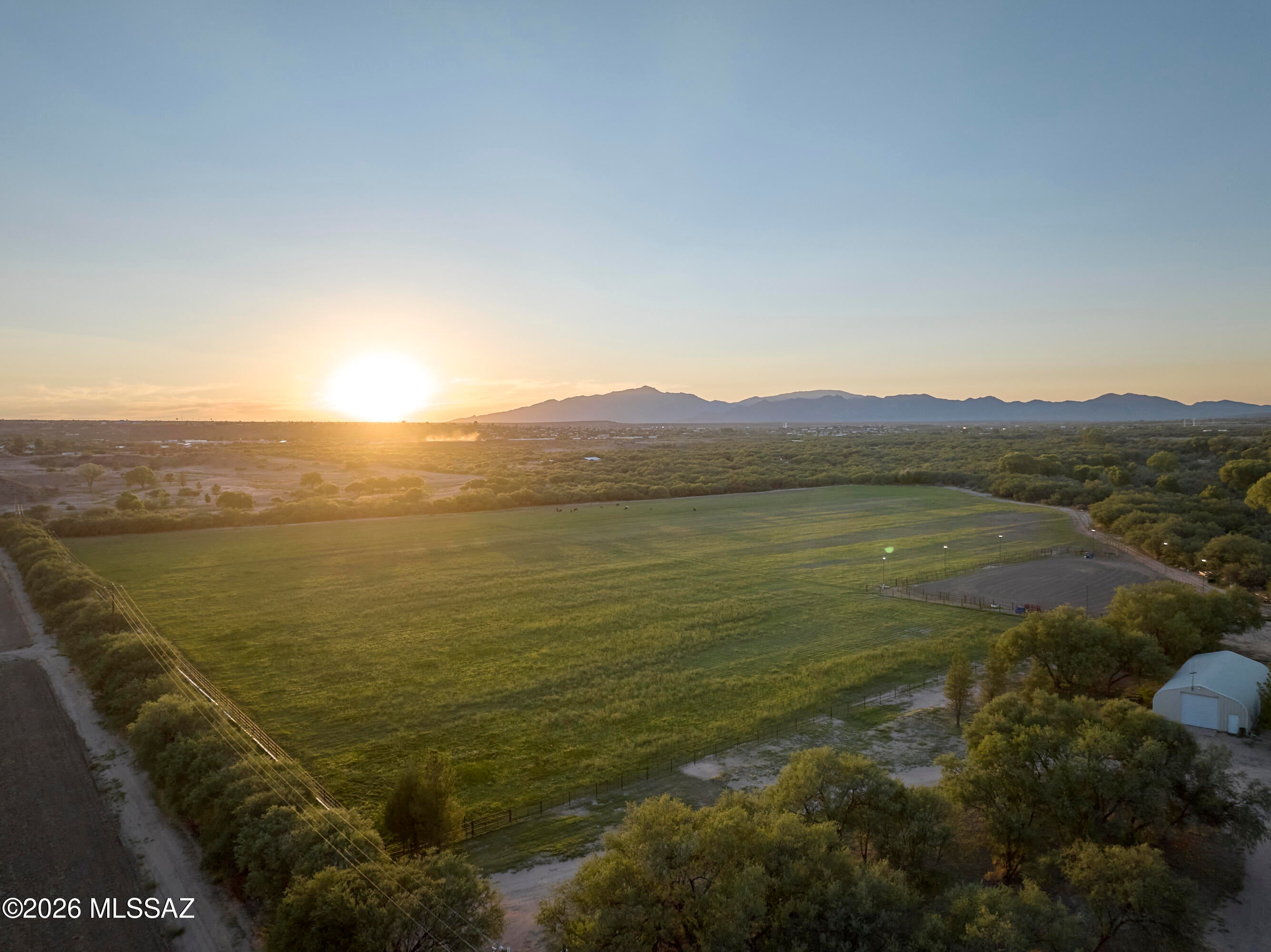 San Pedro Ranch Lot #2 features 58.07 +/- acres ,barndominium with living quarters, feedlot, hay barn, shop, tack room, working corrals, 4 stall horse barn, and 21 irrigated acres with access to the San Pedro River. Well share available. Lot#1 with a modern ranch style home, fenced yard, 3 car carport, grid tie solar, backup generator, equipment barn, 1 RV parking spot on 6 acres is also for sale at $585,000. Property is owner by a licensed real estate broker in Arizona. Call for showing.