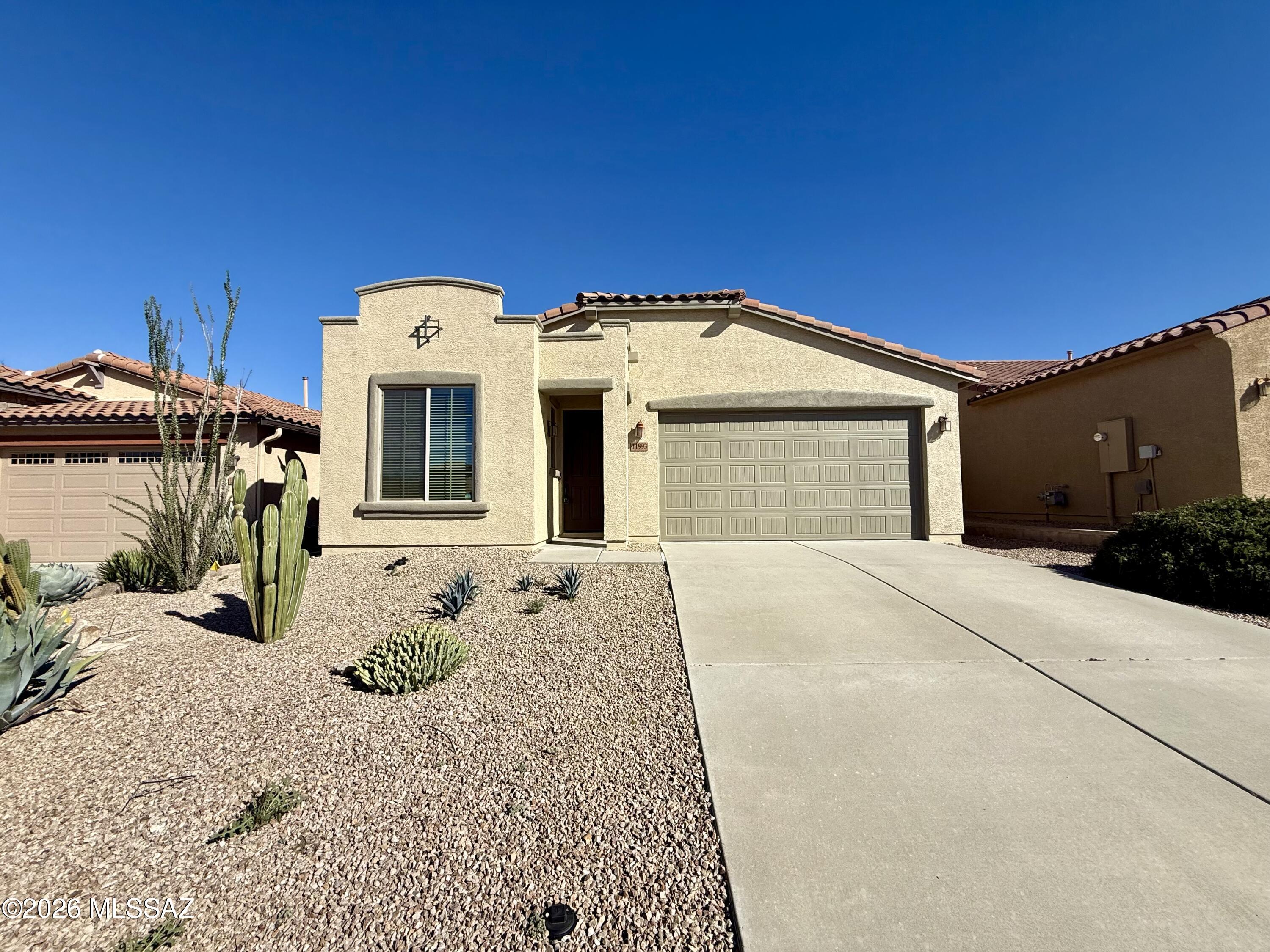 1,943 SQ FT! 3 bedroom, 3 bath home in the desirable Sonoran Vistas community! Nice & open floor plan. Gourmet kitchen with included appliances, & expansive breakfast bar! Open living/dining, great for entertaining. Neutral paint throughout + tile flooring in all the right places! Flexible den space makes great home office/bonus room. Split bedroom floor plan offers 3 generously sized bedrooms, each with optimal privacy! Primary suite with full bath + walk-in closet. Blinds! Laundry room with included washer/dryer. Impressive backyard offers a covered patio, paved seating area, & desert landscaping! **Landscaping Services Included!** 2 car garage. Desirable cul-de-sac lot with N/S exposure & stunning mountain views! Sonoran Vistas offers gated entry, playgrounds, sports courts, & biking/walking trails.