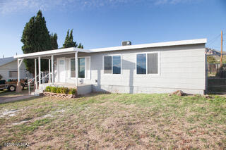 Fully Remodeled 4-Bedroom Gem in the Heart of Huachuca Terrace New, new, new! This rare four-bedroom, two-bath home has been fully remodeled, offering modern comfort and style in the up-and-coming neighborhood of Huachuca Terrace. Featuring beautiful tile flooring throughout, this home combines easy maintenance with sleek design -- perfect for today's busy lifestyle. Set on an extra-large parcel with a fenced backyard, there's plenty of room for outdoor entertaining, gardening, or simply relaxing under Arizona skies. Conveniently located just 30 minutes from Tombstone, Douglas, and Sierra Vista, this property offers the ideal balance of peaceful living and accessibility. The nearby historic town of Old Bisbee adds even more charm with its rich mining heritage, colorful architecture, and vibrant arts scene   truly one of Arizona's hidden treasures.
Close to shopping, dining, and fuel, this move-in-ready home has it all. Don't miss your chance to own a beautifully updated property in a growing area!