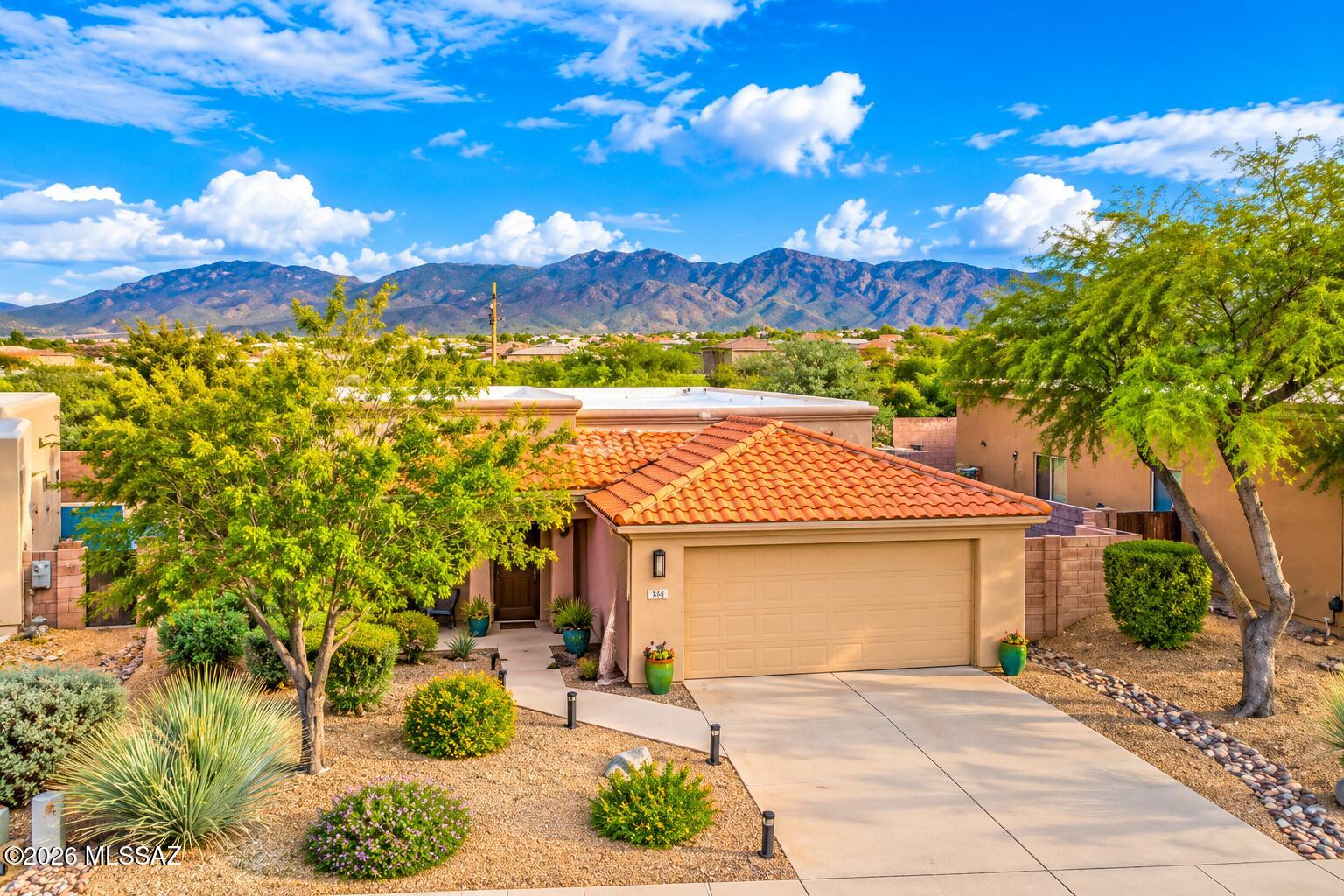 Enjoy the beauty of the Tucson lifestyle in this bright, beautifully refreshed, single-story home offering 1,777 sq. ft., 3 bedrooms, and 2 baths. Nestled on a quiet cul-de-sac in the desirable Casa de Coronado neighborhood, this inviting home features spacious living areas, a refreshed kitchen and baths, and granite countertops. The backyard is a true retreat, showcasing breathtaking Rincon Mountain views, a sparkling fountain, flowering plants, twinkling lights, a built-in barbecue island, and a charming lighted pathway. With no homes directly in front or behind, enjoy added privacy and peaceful surroundings, along with welcome afternoon shade. Conveniently located near shopping, dining, hiking, Sabino Canyon, and Mount Lemmon, this home offers the best of Arizona living!