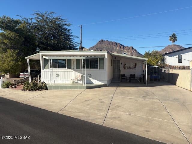 Nice home in great condition that is furnished including the golf cart. Home has two bedrooms and a third 10x12 room that can be used as a bedroom. The laundry is in a separate room that also has additional storage space. Ceilings are taped and textured. Newer double pane windows. Updated bathrooms. Lemon and orange trees. Chain link fenced area for your pet. Covered patio in rear of home. The HOA fee in this 55+ community includes unlimited golf, tennis, pickle ball, shuffleboard, pools, spa, exercise room, trash collection, and much more. You own the land!