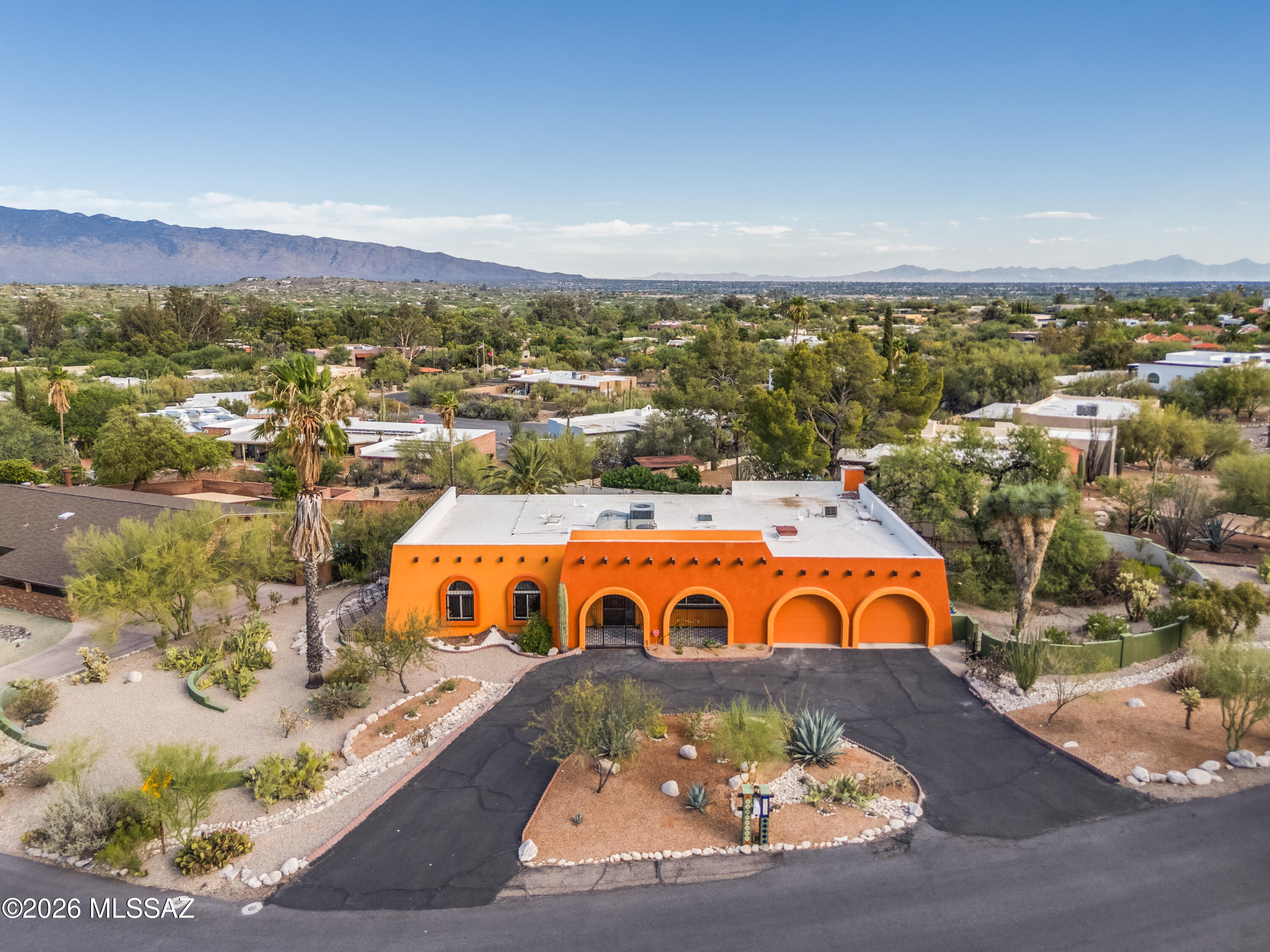 Step into classic Hacienda charm and stunning mountain views in this thoughtfully updated Hidden Valley home. Situated on a quiet street and minutes from Canyon Ranch and Sabino Canyon, it showcases sweeping views of the Rincon and Santa Catalina Mountains from the enclosed front courtyard and outdoor living areas. Completely updated, with recent improvements including remodeled bathrooms featuring a custom oversized shower, fresh exterior paint, new flooring in all bedrooms, and a 2026 water heater. The lush landscaping includes a cactus garden, fruit trees, multiple seating areas, a built-in fire pit, gazebo, and outdoor shower. Voluntary HOA with access to a private 14-acre nature preserve.