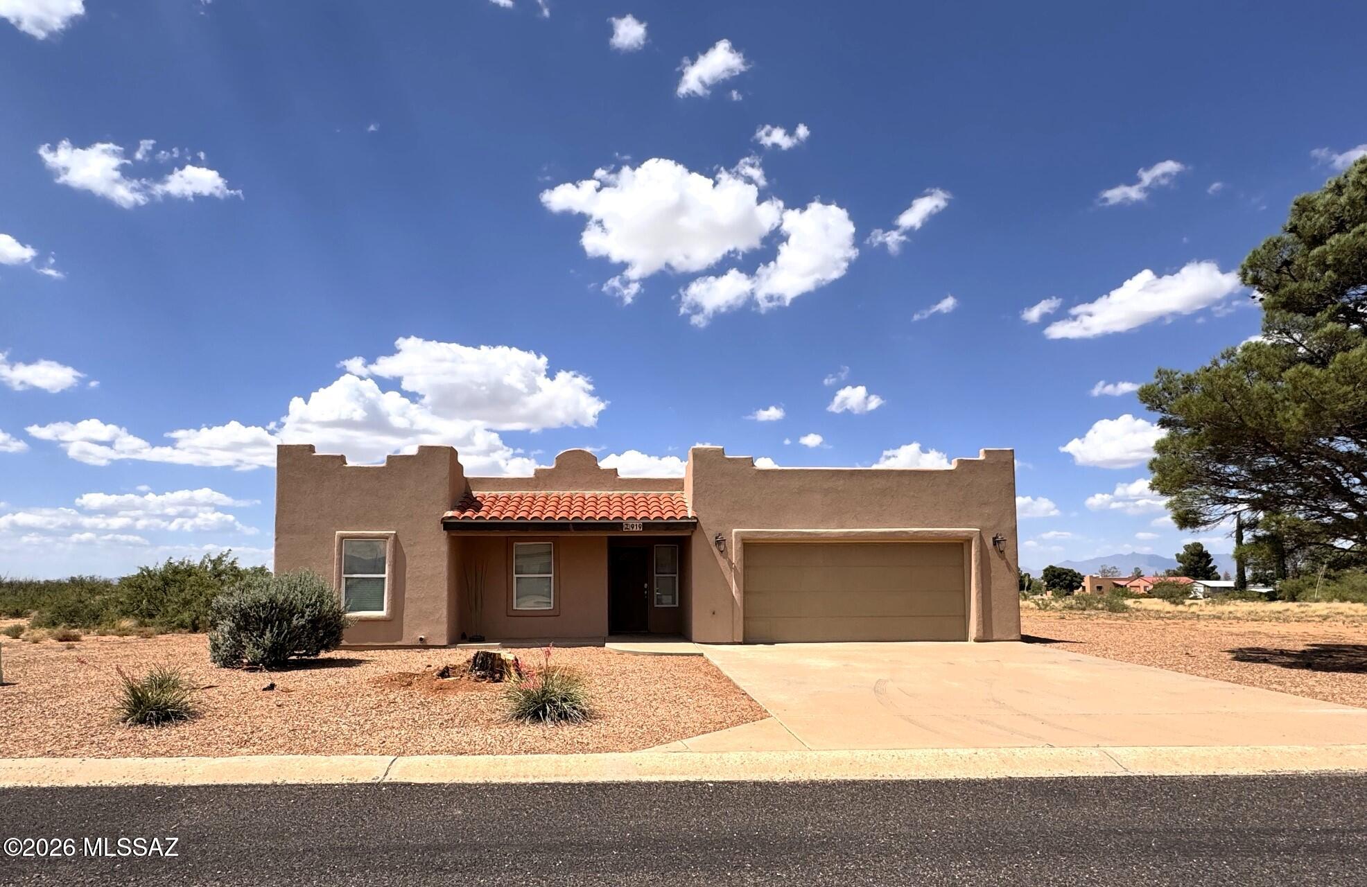 Beautifully maintained Santa Fe-stye home offering exceptional privacy and spetacular views. This move-in-ready property features 3 bedrooms, 2 bathrooms, with tile and wood laminate flooring throughout. The oversized garage includes insulated walls and insulated garage door, along with a full RV hookup.
The home was recently re-stuccoed in 2025, and a complete new roof in 2024. The sale includes all furnishings, dishes, and utensils, making it truly turnkey. Situated on nearly an acre in a quiet neighborhood, this property offers a rare sense of seclusion with only one neighbor across the street. 
Enjoy breathtaking views, amazing sunsets and sunrises, peaceful desert living, and all the comforts this beautiful property has to offer. Schedule your private showing today!
