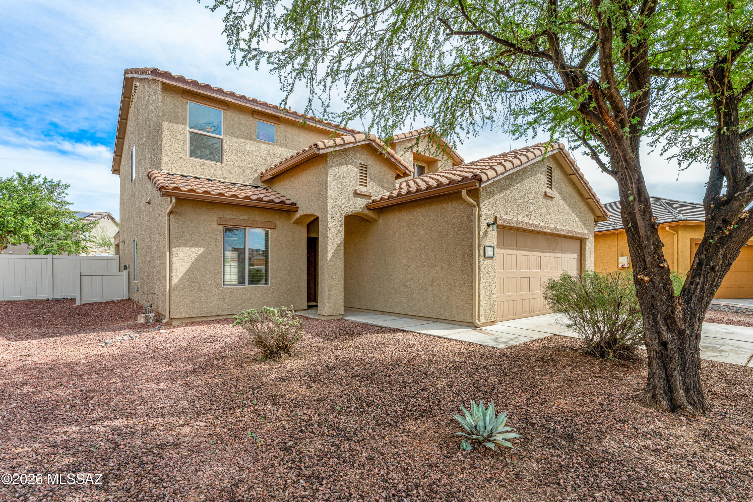 Space, storage & flexibility in Red Rock Village! This spacious 2-story home offers 4 bedrooms plus a downstairs den, 2 full baths & powder room. Enjoy separate living & family rooms, formal dining, downstairs laundry & abundant storage throughout. Wood-look plank flooring flows through much of the home with tile in the kitchen & baths. The primary suite features a generous bath & exceptionally large walk-in closet. Outside, enjoy an expansive permitted covered patio overlooking the large north-facing backyard with a gated dog run. Red Rock Village amenities include a community pool, parks, sports facilities, skate park & walking trails.