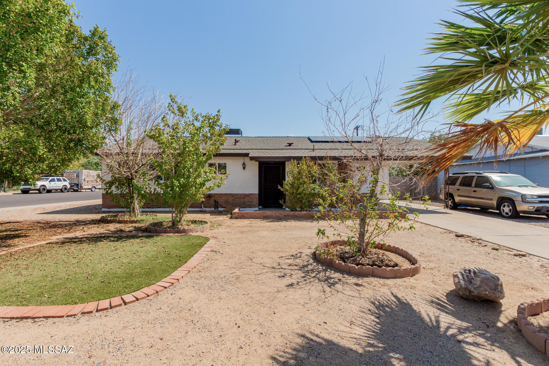 Seize the chance to own this charming 3-bedroom, 2-bath residence on a coveted corner lot! Discover a serene living room with a soothing palette, wood-look flooring, and sliding doors that lead to the backyard for seamless indoor-outdoor flooring. The eat-in kitchen comes with quartz counters, ample wood cabinetry, and essential built-in appliances for an enjoyable cooking experience. The primary bedroom includes a private bathroom for added comfort. Venture out onto the backyard, complete with a spacious covered patio, lush natural turf, pavers, and a shed for additional storage. Many upgrades including brand new OWNED solar & roof, 2024 HVAC, 2024 water heater and 2023 windows! Don't miss out on this fantastic opportunity!