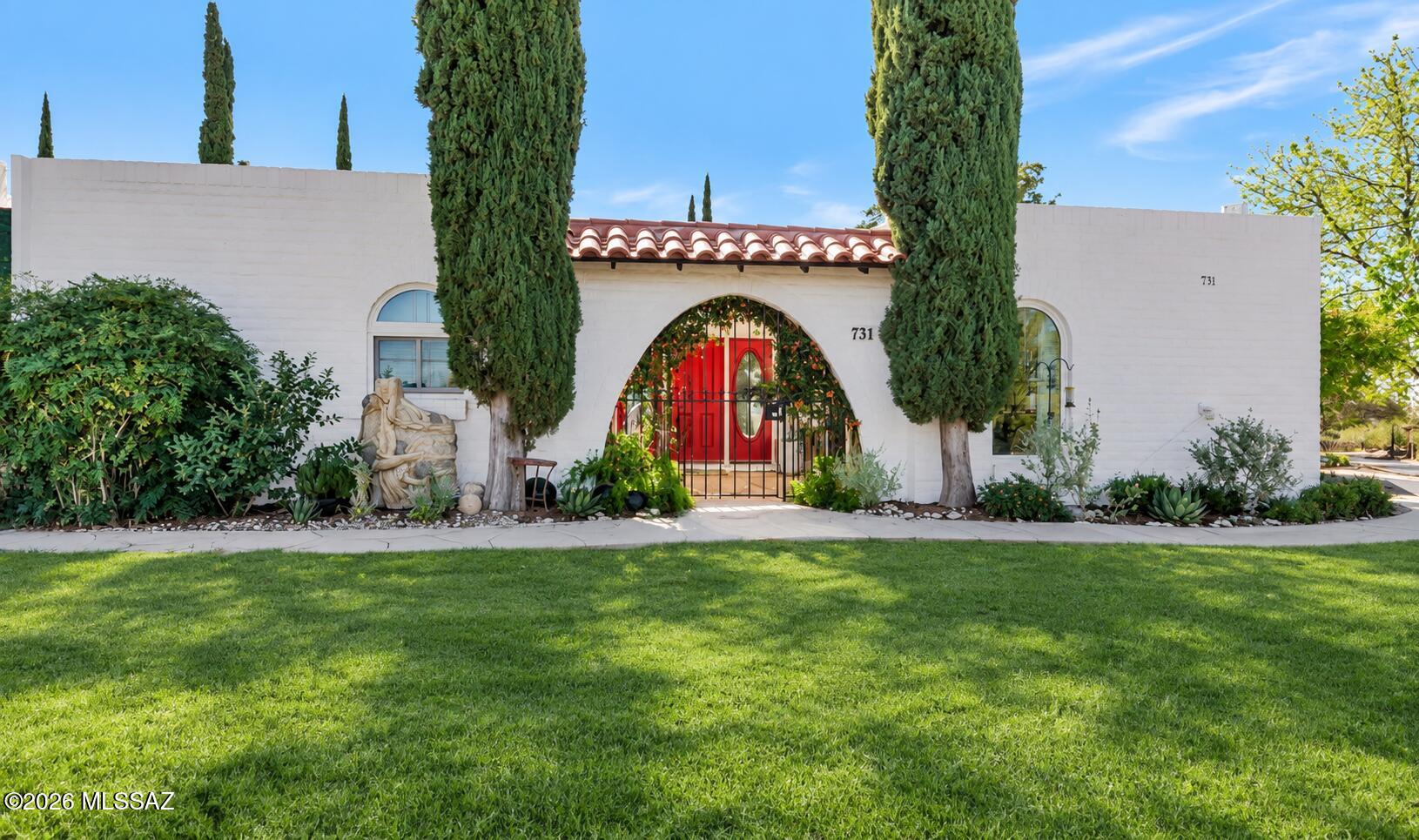 Welcome home to Casitas de Castilian, a historically designated 55+ community designed by AZ architect Benny Gonzales, this sought-after community is known for its timeless Southwestern charm, lush green belts, mature citrus trees, sparkling pools and tennis court, creating a peaceful yet active lifestyle setting. This two-bedroom, 2 bath town home offers a light and bright interior with thoughtful updates throughout. Enjoy newer windows and an updated kitchen featuring Silestone countertops, refreshed cabinetry, skylights resealed & roof recoated Sept 2026. Resident interior condo insurance optional per HOA. Two private patios provide the perfect spaces to sip your favorite beverage, entertain guests, or simply relax. and enjoy Tucson's beautiful weather. Conveniently located near shopping, dining, and everyday amenities, this home offers the perfect blend of tranquility and accessibility. If you're looking for low maintenance living in one of Tucson's most iconic 55+ communities, this is it!