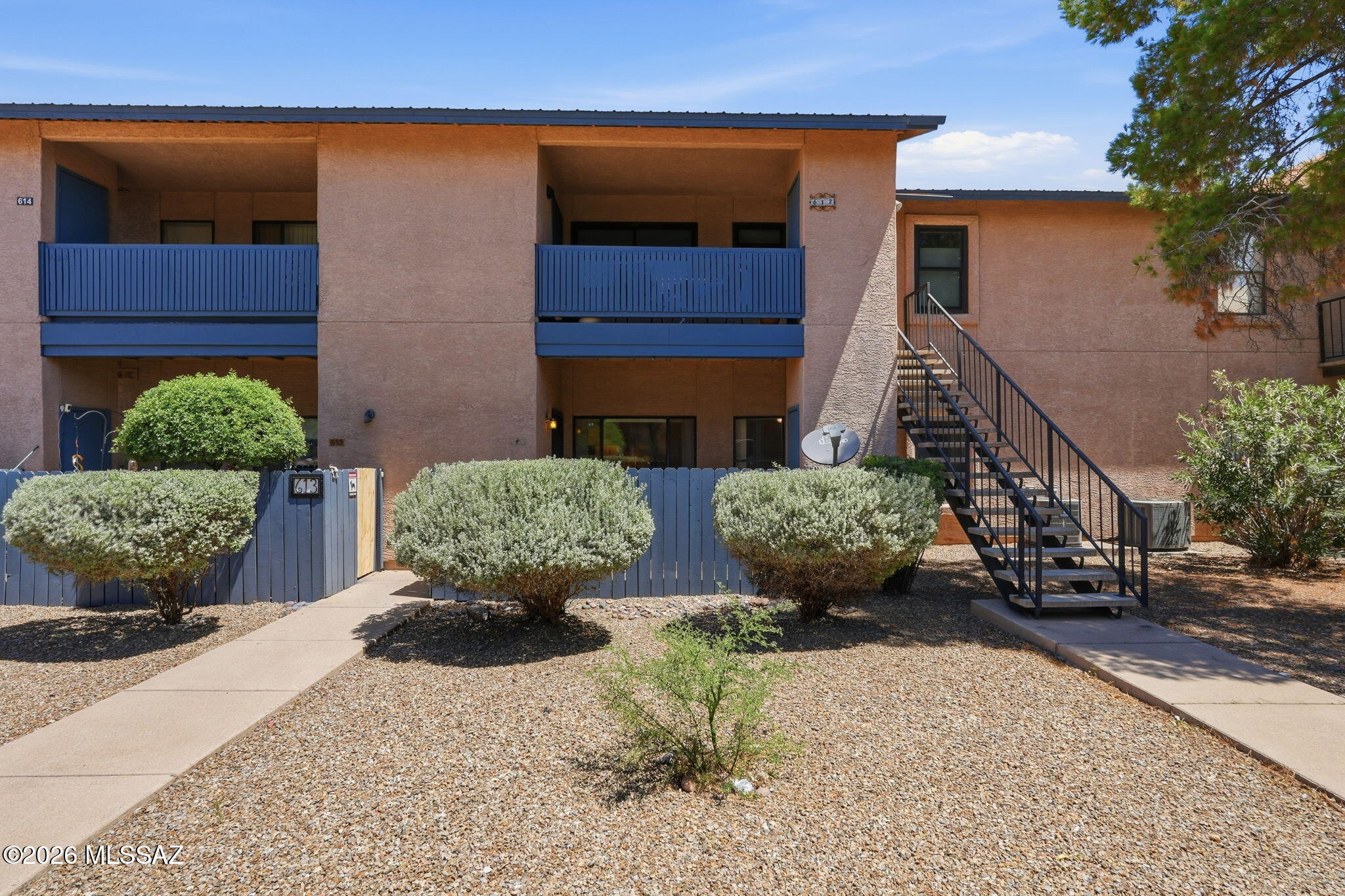 Welcome to Rincon Village! This move-in ready ground floor condo offers 2 bedrooms, 2 bathrooms, fresh interior paint, new carpet, and a 3 year old HVAC system. Inside, you'll find a comfortable living area, a dining space with breakfast bar, and a kitchen with ample cabinet storage. The primary suite includes a mirrored walk-in closet and a private full bath. A washer, dryer, and assigned covered parking are included for added convenience. Enjoy your private front patio along with community amenities including a pool, spa, and well-maintained common areas. Ideally located in East-Central Tucson near shopping, dining, and everyday conveniences. Seller is also offering a one-year home warranty.