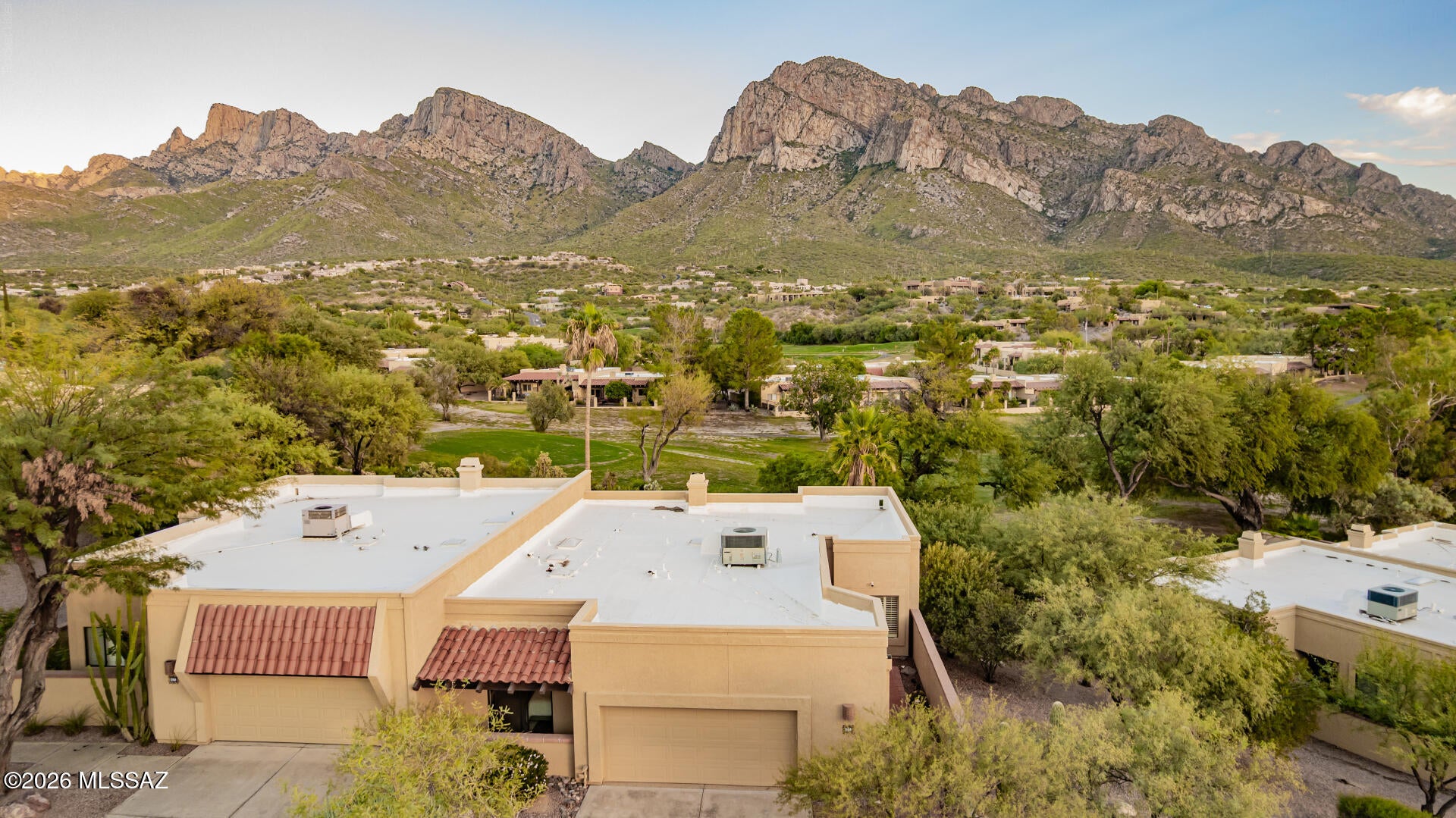Experience exceptional El Conquistador living with breathtaking Pusch Ridge, mountain and golf course views--arguably among the finest in the community. This beautifully reimagined 1,820 sq. ft. residence offers 2 bedrooms, 2 baths plus a den. The $100k+ refined interior showcases new flooring, cabinetry, trim, designer hardware, fresh paint and enhanced lighting throughout. The updated kitchen features a full tile backsplash, GE Café convection microwave, dishwasher & range recessed, pendant and under-cabinet lighting. Redesigned architectural openings enhance the flow, while updated baths, a wood-burning fireplace, newer ceiling fans, USB power, a new nook window and numerous thoughtful enhancements complete this exceptional home. Quaint backyard perfect for soaking in the mountain view