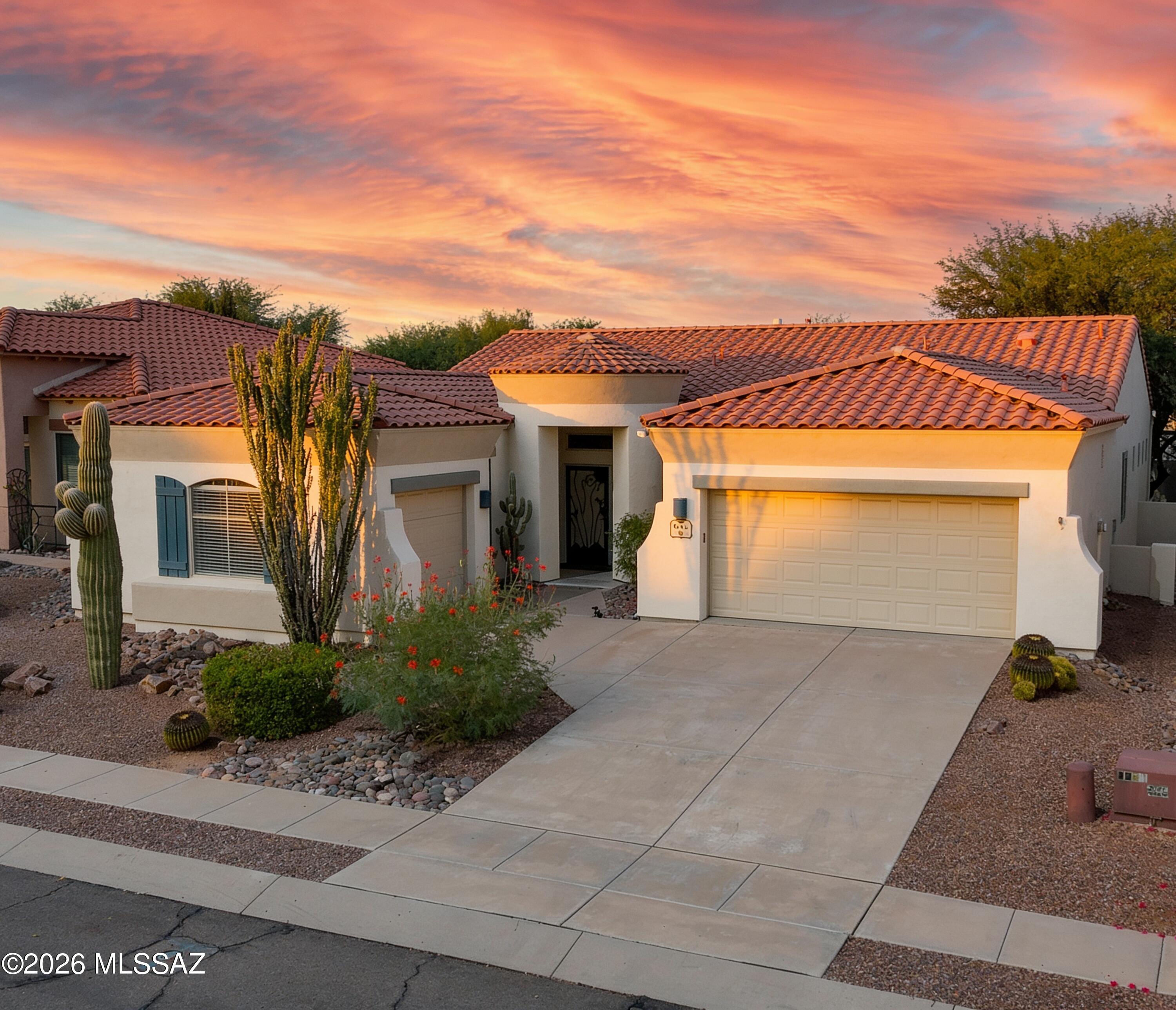 Welcome to this beautiful single-story Sonoita model in the desirable Presidio De La Madera subdivision of Rancho Sahuarita. This move-in-ready 3-bedroom, 2-bath home features a bonus room with a closet, split-bedroom floor plan, open-concept living, and a 2-car garage. Enjoy stainless steel appliances, Corian countertops, custom blinds, Pella windows and doors, North/South exposure, mature landscaping with a professional drip system, and a private backyard. Recent updates include a new water heater, microwave, utility sink, and freshly painted exterior. Conveniently located near the lake and park--don't miss this wonderful Rancho Sahuarita home!