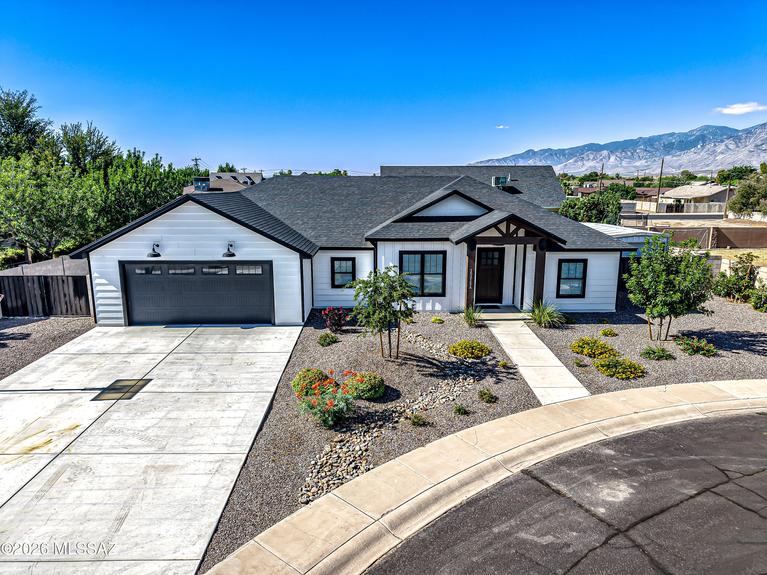 Built in 2019 by Truline Custom Homes, this beautifully upgraded home in Cluff El Dorado Estates offers the features buyers are searching for. Situated on a quiet cul-de-sac, the property includes a heated saltwater pool, covered patio with paver surround, full landscaping with underground electrical, drip and sprinkler systems, and an RV hookup. The kitchen features upgraded cabinetry, quartz countertops, and a butler's pantry. The spacious primary suite offers a large soaking tub and a stunning custom tiled walk-in shower. Additional highlights include a tankless gas water heater, gas hookup for an outdoor BBQ or grill, and two storage sheds. Thoughtfully designed inside and out, this is a property you won't want to miss!