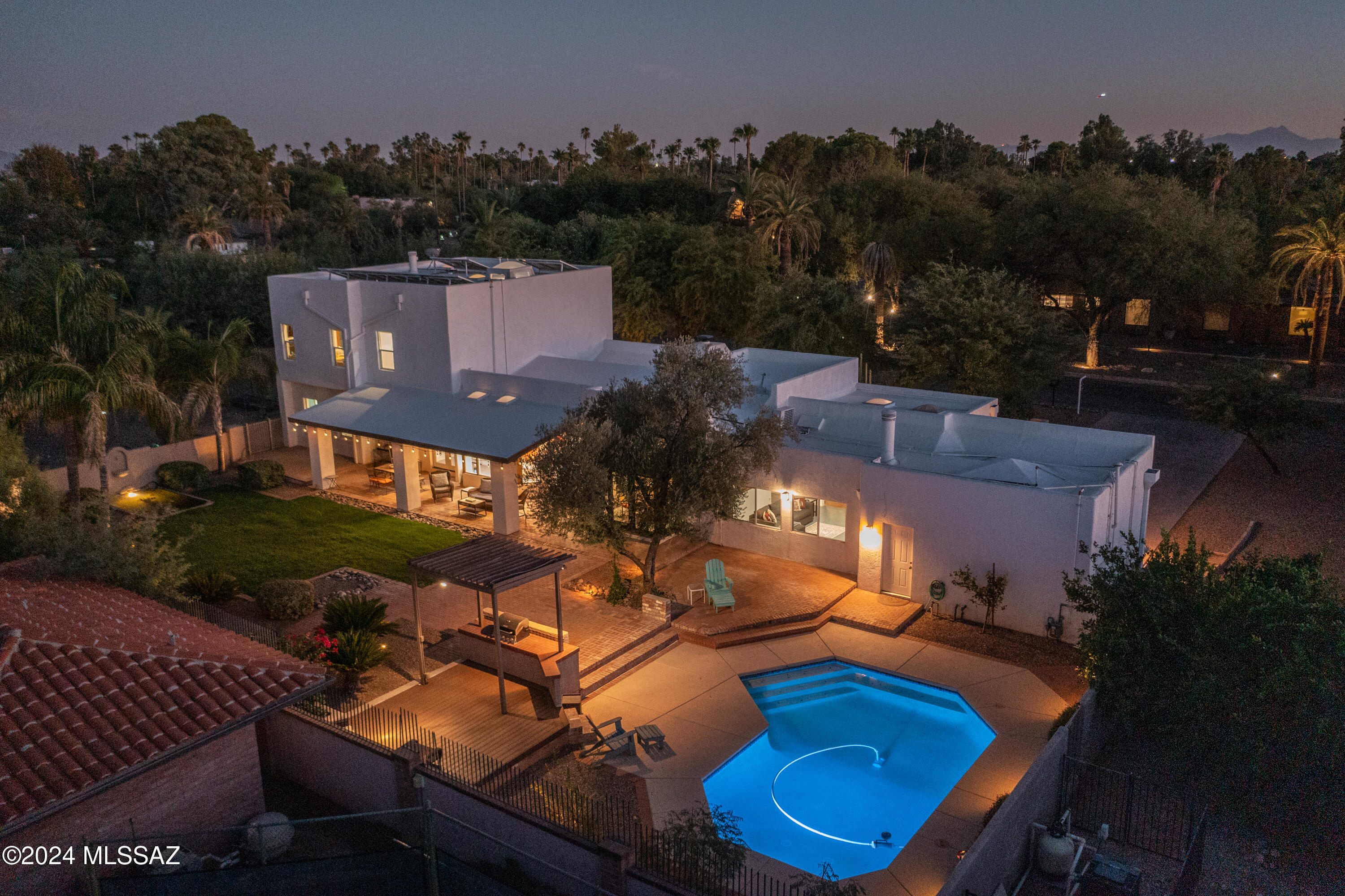 Nestled on a sprawling half-acre corner lot in the prestigious Historic El Encanto neighborhood, this exquisite 3,846 sq. ft. residence seamlessly blends 1941 charm with contemporary luxury.  Designed by the prestigious Richard A Morse and Arthur T Brown Architects. Meticulously upgraded in 2016 - present, the home boasts 4 bedrooms and 4 bathrooms, featuring vaulted entry ceiling and abundant natural light throughout. The gourmet kitchen, a chef's delight, offers ample cabinet space, while the upstairs primary suite impresses with its ensuite, fireplace, balcony, and private spiral staircase.
Additional living area could be used as an attached guest quarter, complete with a living area and full bathroom, provide privacy for visitors and separate access. Three woodburning fireplaces