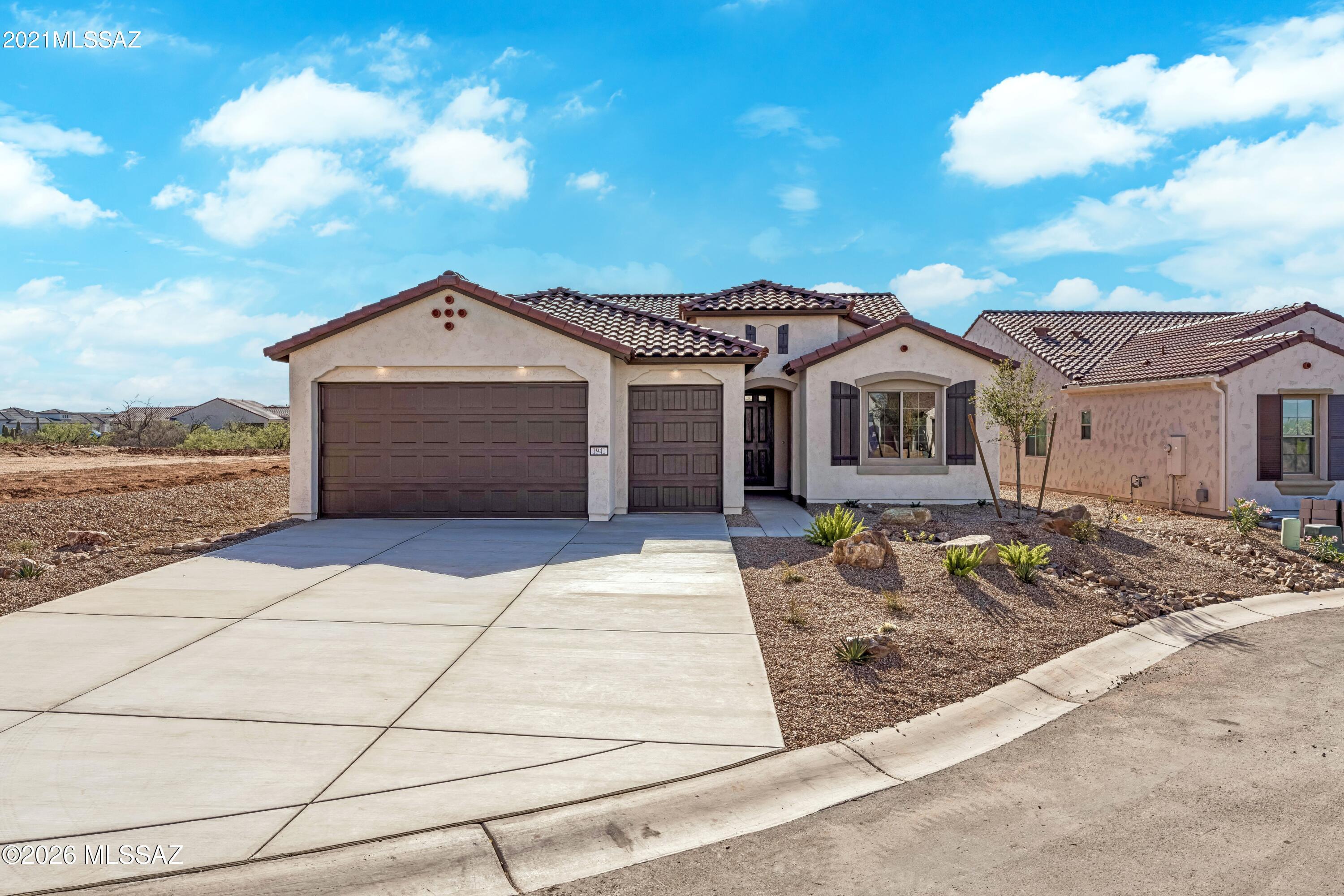 Move-in-ready home ''Agave'' Open-concept, Great Room, bright open space throughout. Enjoy eating in this gourmet kitchen with Arctic White cabinets with 41'' uppers, quartz countertop, LG stainless steel appliances. Upgrades include golf cart garage, 4' extension at garage, bay window at dining room, and upper and lower cabinets at laundry. Upgraded carpet and luxury vinyl plank.  Two-tone paint throughout, 8 ft doors throughout, walk in shower and walk-in closet. Extra room is a den.  Home boasts beautiful touches with so much more.  Come and live in a luxury resort community.  Fully landscaped.
