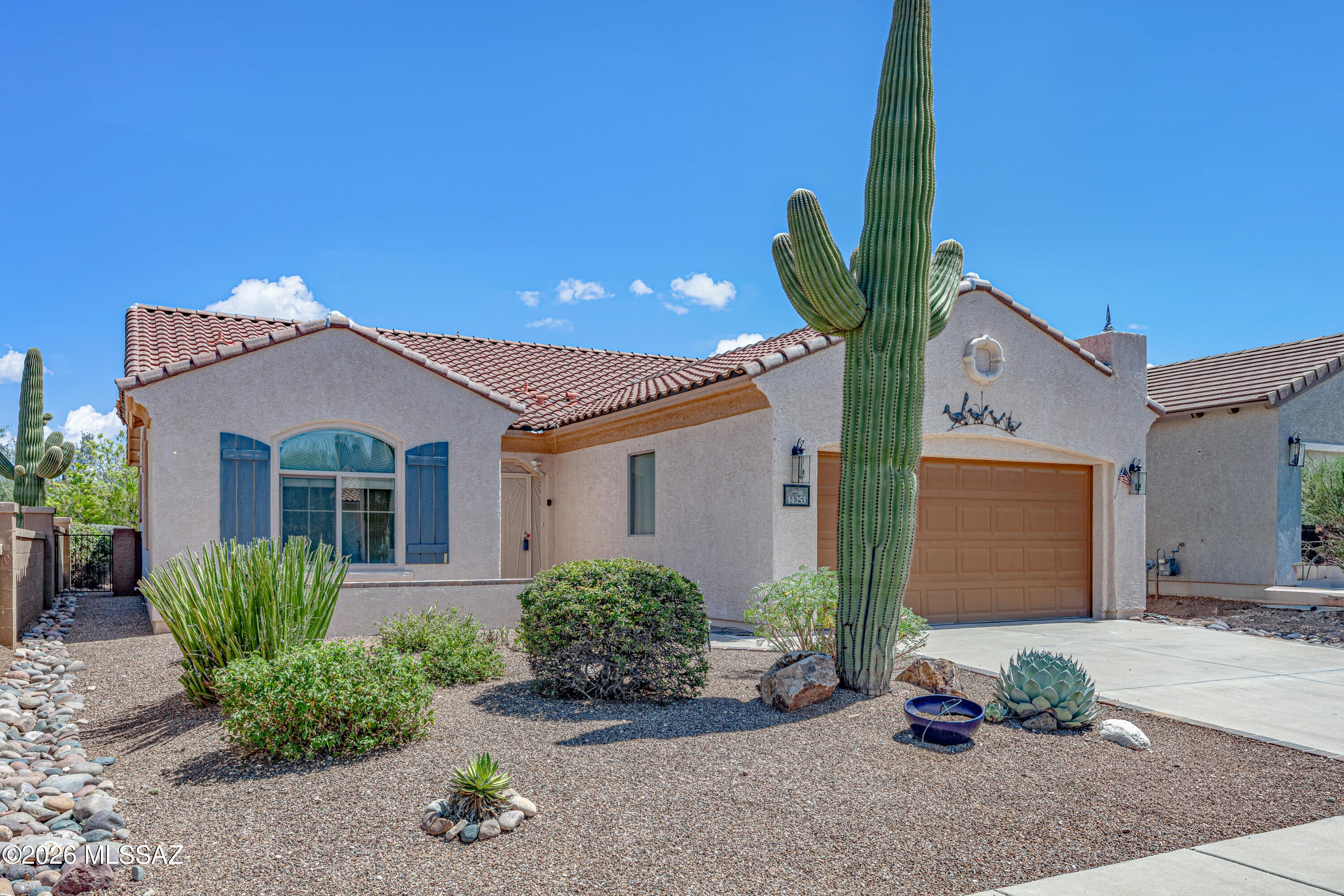 Beautifully maintained Del Webb home in Sonora at Rancho Sahuarita! Freshly painted interior, 2024 completely replaced HVAC system which includes a 10 year transferable warranty. 2025 new stainless steel refrigerator. This split bedroom 3+2 floor plan offers flexible secondary rooms for a guest suite, a home office, or a hobby room. Kitchen includes ample cabinetry, a pantry, elevated dishwasher, and a breakfast bar.  Abundant windows fill the home with natural light, high ceilings and graceful arches create an open feel. Tile throughout offers easy cleaning. Enjoy a large covered back patio, citrus trees, and no rear neighbors. 55+ Living at it's finest with access to two clubhouses for unending events,trails, lake access and more. The spacious primary suite includes a bay window, walk-in closet and ensuite bathroom with dual sinks. Outside, enjoy mountain views, mature citrus trees, and an extended covered paver patio in a beautifully landscaped, southeast-facing backyard. Property offers added privacy and peaceful desert surroundings. Located just down the street from the private Sonora clubhouse, residents enjoy a fitness center, pool and spa, pickle ball and bocce ball courts, arts and crafts spaces, social activities, and access to Rancho Sahuarita's additional resort-style amenities all classes events and more. True resort living. Perfect If you want all Tucson has to offer without the noise of Tucson, but you also want 55+ living without committing to Green Valley. A must-see!