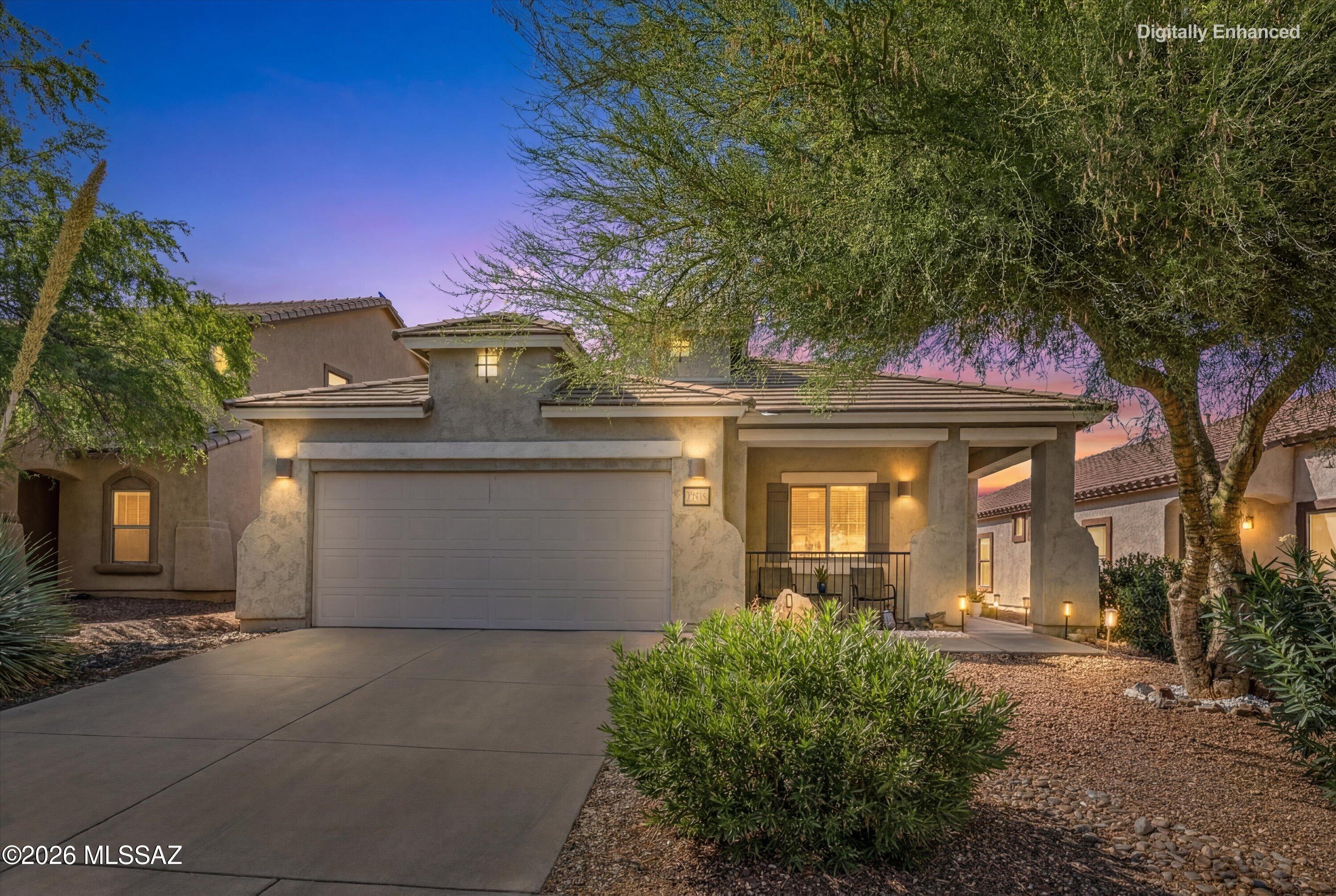 Welcome to this beautifully maintained single-story home located in the heart of Rancho Sahuarita, one of Southern Arizona's most sought-after award-winning master-planned communities. Ideally situated near neighborhood parks, playgrounds, walking paths, pools, and the community's incredible amenities, this home offers the perfect blend of comfort, convenience, and lifestyle.
From the moment you arrive, you'll appreciate the charming curb appeal, mature landscaping, and inviting front porch that create a warm and welcoming first impression. Inside, beautiful neutral flooring flows throughout the home, complementing the bright and functional floorplan. Designed with everyday living in mind, the spacious kitchen offers ample cabinetry, generous counter space, and a cozy breakfast nook for casual dining. An additional flex space provides endless possibilities and can easily serve as a formal dining room, home office, hobby area, or second living space.
The open-concept layout creates a seamless flow between the main living areas, making the home feel both spacious and inviting. Pride of ownership is evident throughout, with every space thoughtfully cared for and exceptionally maintained.
Step outside to discover a backyard full of charm and character. Designed with a garden-inspired feel, this cozy outdoor retreat features artificial turf, colorful plantings, and inviting spaces to relax, entertain, or simply enjoy Arizona's beautiful weather. The combination of low-maintenance landscaping and lush greenery creates a peaceful setting that feels both welcoming and private.
If you've been searching for a move-in ready home with a functional layout, beautiful curb appeal, and access to Rancho Sahuarita's exceptional amenities, this lovingly maintained home is one you won't want to miss