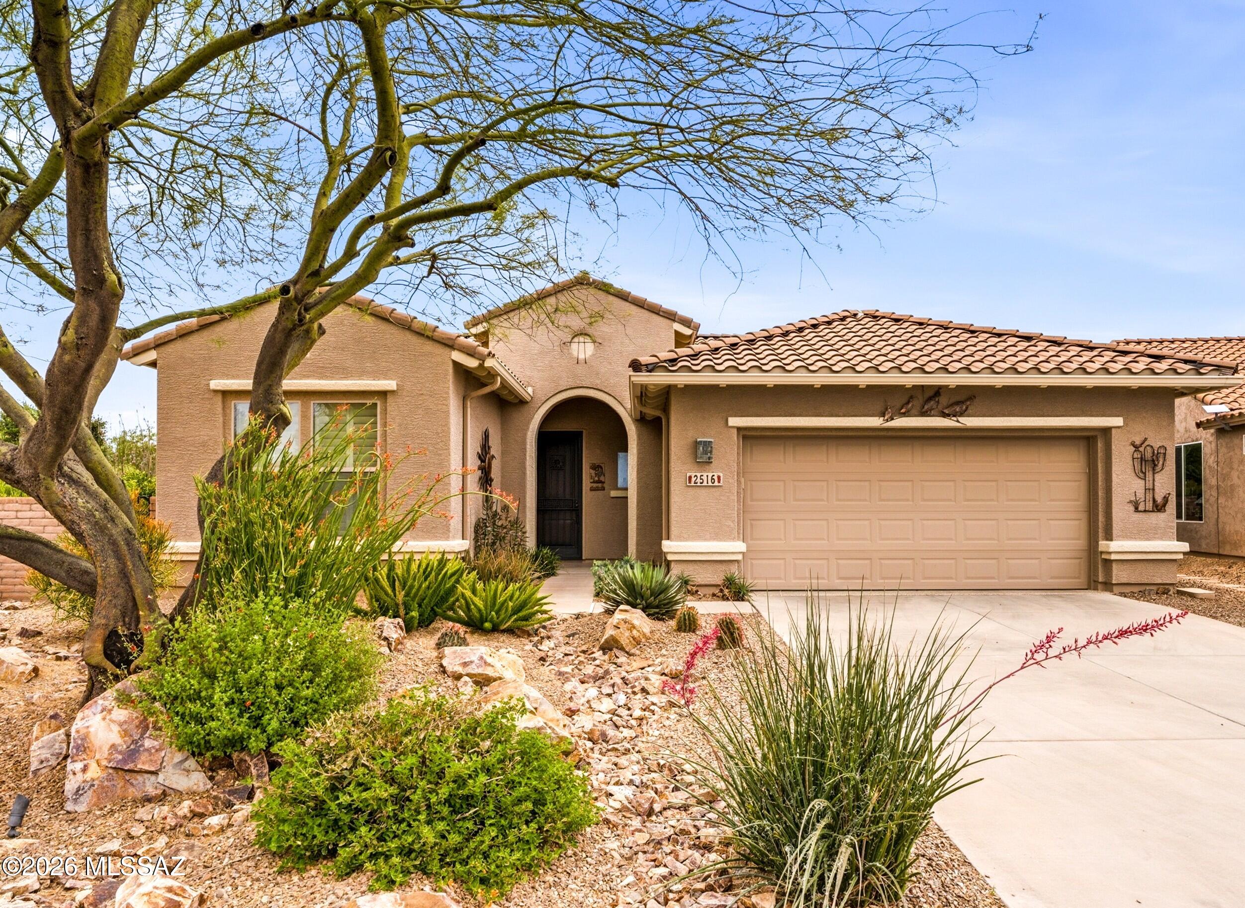Welcome to your private Quail Creek oasis! Set on a premium ¼+ acre lot backing to a scenic arroyo, this beautifully updated 2-bedroom, 2-bath home plus den offers privacy and exceptional indoor-outdoor living. The gorgeous designer kitchen remodel is a standout, featuring custom wood cabinetry, burnished bronze hardware, granite countertops with a thick beveled edge, decorative backsplash, newer sink and faucet, and upgraded stainless-steel appliances. The newer GE Cafe 6-burner gas range and microwave with air-fryer function, premium dishwasher, and large pantry complete this impressive kitchen. The adjacent dining area features a charming bay window, plantation shutters and patio door overlooking the lush backyard.
The flexible den includes French doors and a custom Murphy bed perfect for a home office, hobbies, or overnight guests. The spacious primary bedroom features a bay window and large closet, while both the primary and guest rooms have NEW carpet and plantation shutters. Both bathrooms have been refreshed with new granite countertops and mirrors, and a new water softener adds everyday convenience.
Step outside and fall in love! The private backyard is a true retreat, beautifully landscaped with mature Meyer lemon and orange trees and roses. Relax beneath the Sunesta retractable awning on the rear patio with durable polyurethane flooring, soak in the Bullfrog Deluxe 5-person hot tub with interchangeable jets, or gather around the outdoor fire pit and enjoy the peaceful arroyo setting. Additional highlights include a polyurethane-finished garage floor, adding a clean, polished, low-maintenance touch to the garage. Beautifully updated, incredibly private, and designed for Arizona living--this Quail Creek gem is ready to impress!
