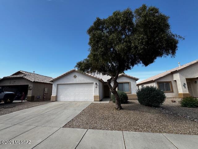Check out Rosevale community in Northwest Tucson! It's convenient to shopping, biking/walking paths, gyms and golfing with easy I-10 access. This home features a great room floor plan, open concept featuring the kitchen at the center of it all. Kitchen has a large island with bar stool seating for 6, double door pantry and includes stainless steel appliances. Formal dining area has ample room for large dining table that is situated perfectly for family and entertainment. This home features a split bedroom layout with tile flooring throughout with brand new carpet in bedrooms. The primary bedroom has walk-in-closest, en-suite with a double two head shower and dual vanities. Guest bedrooms and bathroom are separate wing great for privacy. Finally, cool off under the full-length covered backyard that over looks a low maintenance yard that will be great for parties or just relaxing. Come take a look!