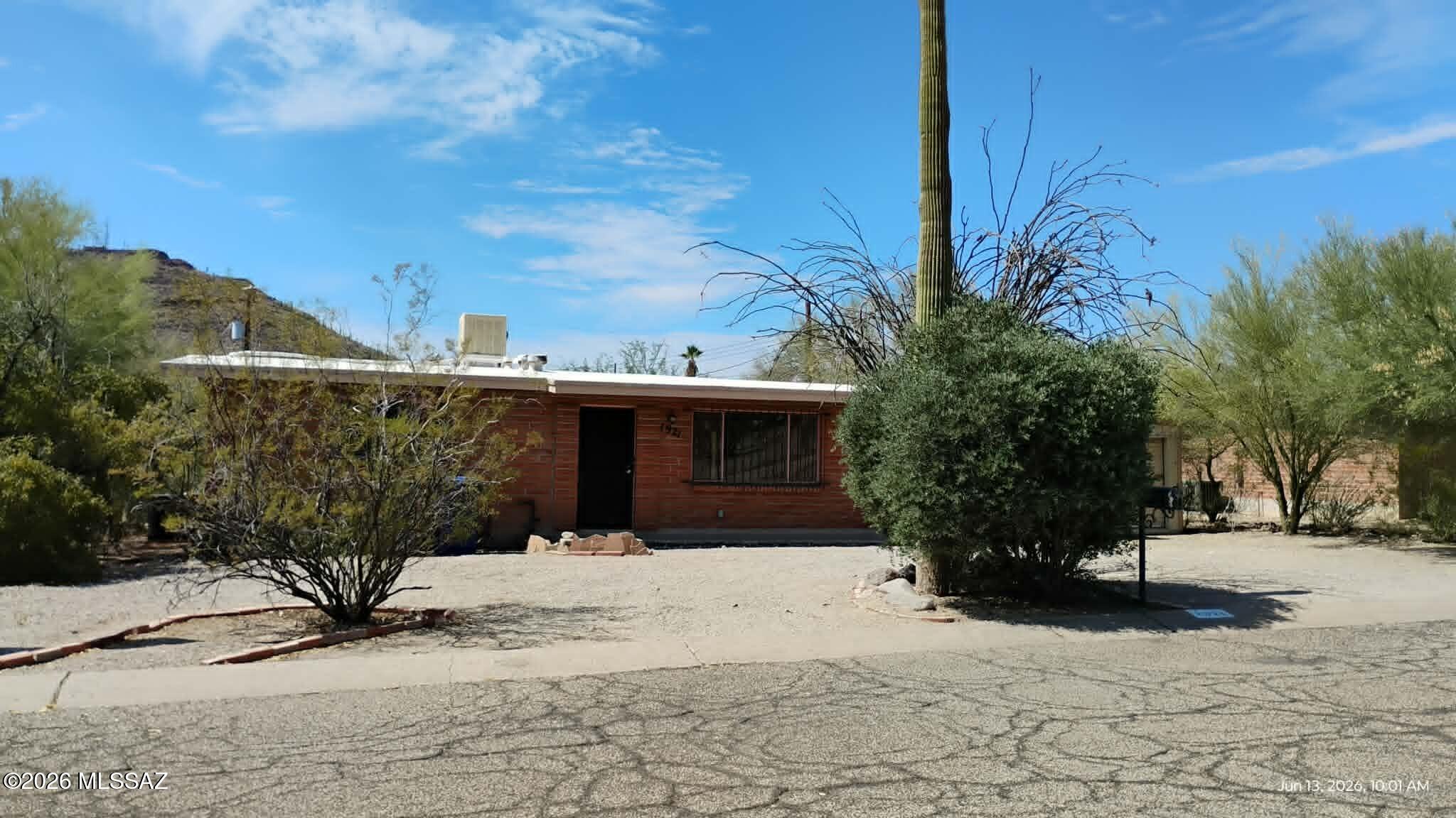 Rare opportunity in coveted Westwood Hills! This charming 1962 brick Mid-Century home is only on its second owner and offers 2 beds, 1 bath, and 988 sq ft of character. Walk to Tumamoc Hill, Pima West, and enjoy quick access to St. Mary's Hospital, I-10, the Streetcar, Mercado District, Downtown, 4th Ave, and UofA. Surrounded by desert beauty with iconic saguaros, ocotillo, and Tumamoc views. Original Mid-Century features plus updated 200-amp electrical panel, 4-year-old HVAC, new refrigerator, and washer included. No HOA, yet a wonderful community with a neighborhood pool.  8.5ft x 12ft storage shed could be relocated to create RV parking. A perfect fit for first-time buyers, Mid-Century enthusiasts, or anyone seeking Tucson's best lifestyle and location.