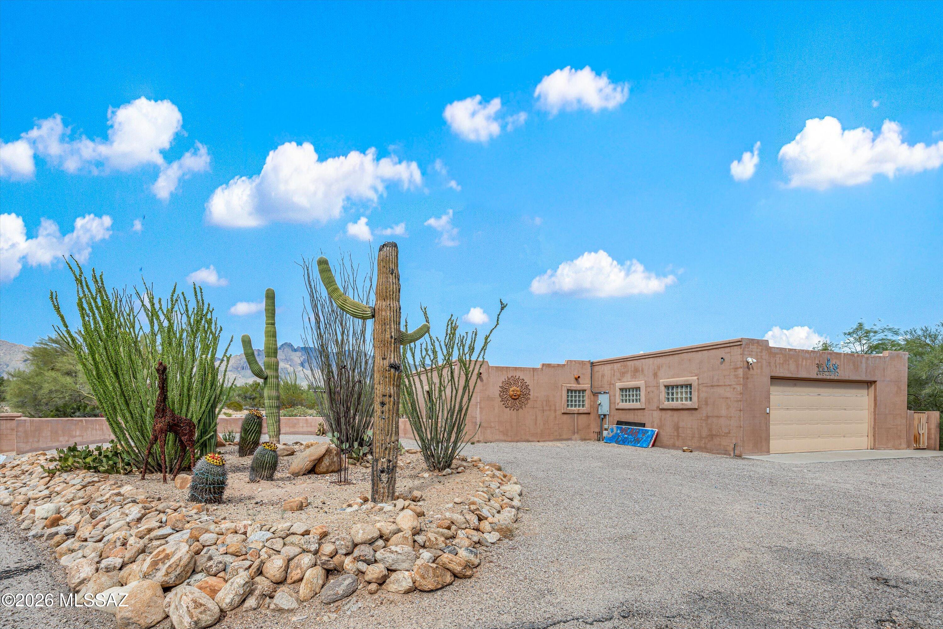 Ideally located on Tucson's desirable North side,  welcome to this stunning 3,209 sq ft home, perfectly designed for comfortable living & entertaining! Featuring formal living room & dining spaces, a large family room, a kitchen with granite counters & breakfast bar, with a convenient office nook. The spacious primary suite offers two master closets, a
walk-in shower & a desk area. A second primary suite includes a private bath & attached flex room, while the other two bedrooms offer unique step-down spaces. An oversized 2-car garage provides plenty of space & storage. The backyard is a true OASIS! With a covered patio, built-in BBQ, Pebble Tec pool and spa, lighted basketball court, play area, and breathtaking Catalina Mountain views. An entertainer's dream you won't want to miss