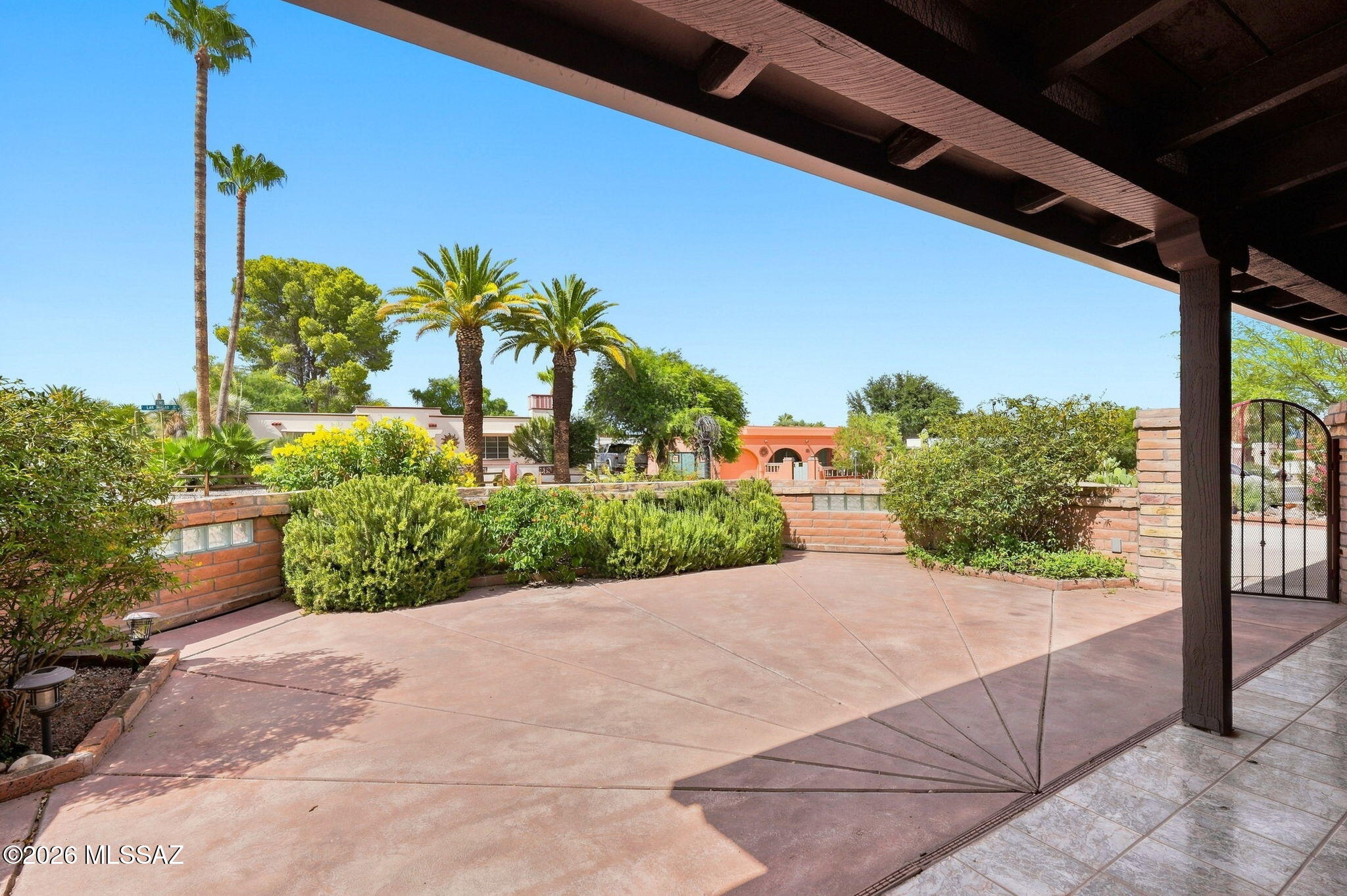 Discover this charming Southwest GEM. 1,725 sq. ft. corner-lot home in Green Valley Fairways 2, offering 2 bedrooms, 2 baths, a versatile den/office with barn doors, and a spacious Arizona room with a 2022 mini-split. Enjoy mountain views from the lush rear patio and year-round greenery in the private courtyard. A dedicated hobby room provides generous counter and cabinet space, while the detached workshop offers even more flexibility. Additional highlights include a 2023 NuFlow sewer line with warranty, maintained HVAC, water softener, reverse osmosis, rain gutters, solar screens, and solar tubes. A wonderful blend of comfort, functionality, and inviting indoor-outdoor living!
