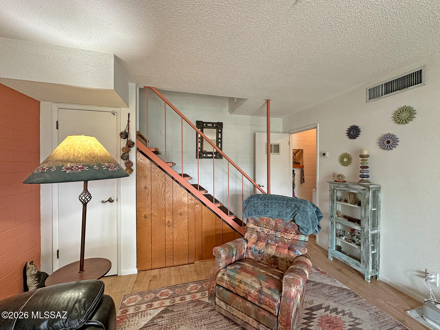 Range marketing $89,000-95,000. Charming Central Tucson two-story co-op townhouse featuring 2 bedrooms and 1.5 baths in a highly convenient location. This well-maintained home offers dual-pane windows, central A/C and heat, and attractive laminate wood flooring throughout. The inviting front bricked-in yard includes a gazebo that provides shade and creates a comfortable outdoor sitting area. The kitchen comes equipped with a refrigerator and oven/stove, and a stacked washer and dryer are also included for added convenience. Located just minutes from shopping, restaurants, and bus lines, with Reid Park nearby offering a golf course, dog park, and walking paths. Downtown Tucson and the University of Arizona are only a short drive away. Cash only; no rentals permitted.