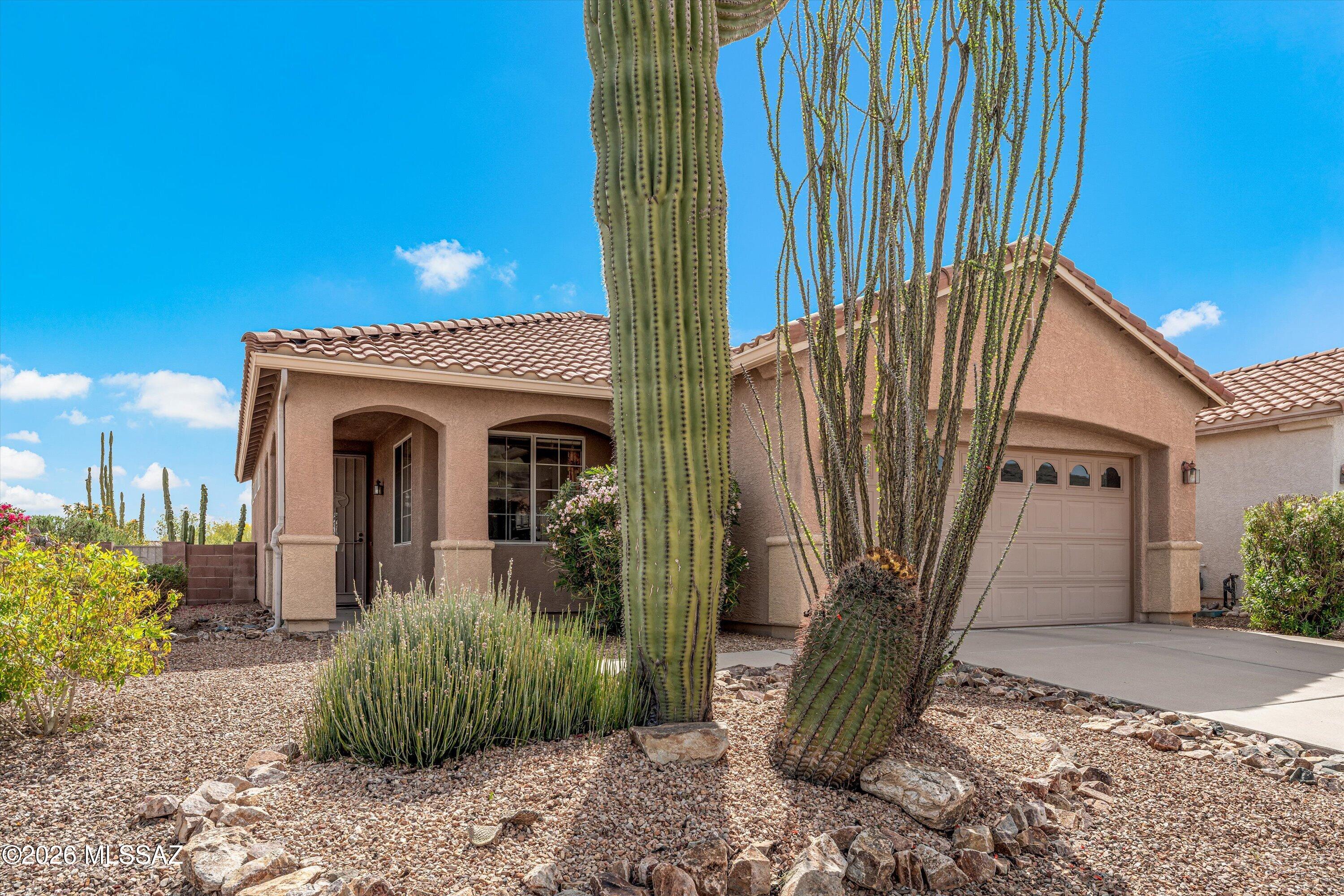 Welcome to this splendid Sedona floor plan offering 1484 sq ft, featuring two bedrooms and a versatile den. As you enter the home, you are welcomed by an open and inviting layout designed for comfortable living and easy entertaining. The updated kitchen is anchored  by quartz countertops and a bright, functional layout that flows seamlessly into the living and dining areas. A spacious primary boasts an en-suite with step-in shower and  walk-in closet. The guest bedroom is close to the guest bath for added convenience for guests. The den is a great spot for work or play. Backyard sits on a desirable corner lot with beautiful mountain views and a  covered patio, ideal for relaxing. Updated HVAC system, interior laundry room and a two-car garage with room for storage completes this home.