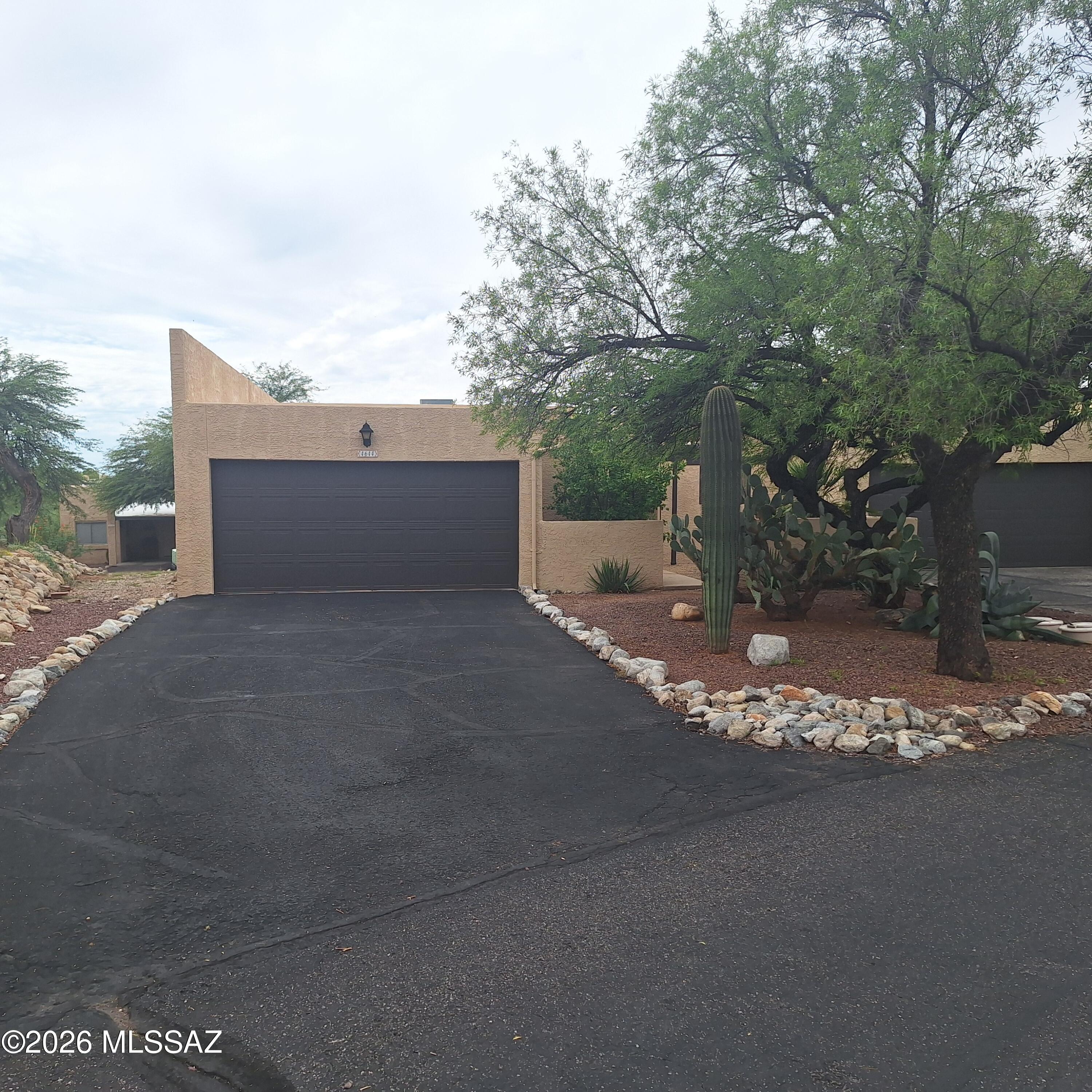 3 Bedroom orginal/now a 2 br/can be converted back ... upgraded master bathroom ... new exterior paint ... 2 car garage ... bricked-in rear patio ... cul de sac street ... near community pool.