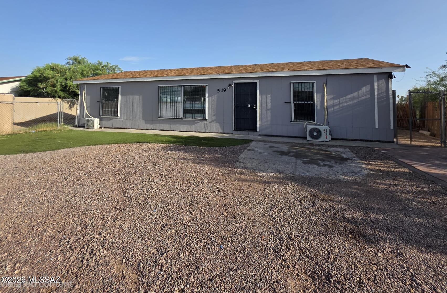 Spacious 3 bedroom, 2 bath manufactured home in a convenient Tucson location. Move-in ready property features several recent upgrades including newer roof, 4 mini split heating & cooling units and new flooring. Enjoy a large fenced lot with plenty of parking and outdoor space. Near shopping, dining, schools and no HOA.