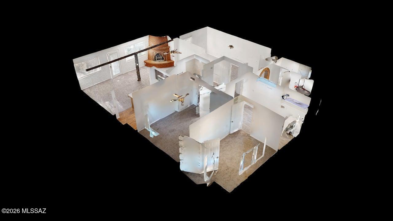 Discover this beautifully updated 3-bedroom, 2-bath home in a convenient Central Tucson location! The efficient, open layout features minimal hallways, a welcoming living room with a fireplace, new flooring, and a new AC unit. The remodeled kitchen offers quartz countertops, abundant cabinetry, a center island, and breakfast bar seating. Both bathrooms have also been tastefully remodeled. Outside, enjoy a gated carport, covered patio, built-in grill, and an exceptionally large backyard with plenty of room to entertain, garden, or explore the possibility of adding a guest house or second unit. Zoned R-2.