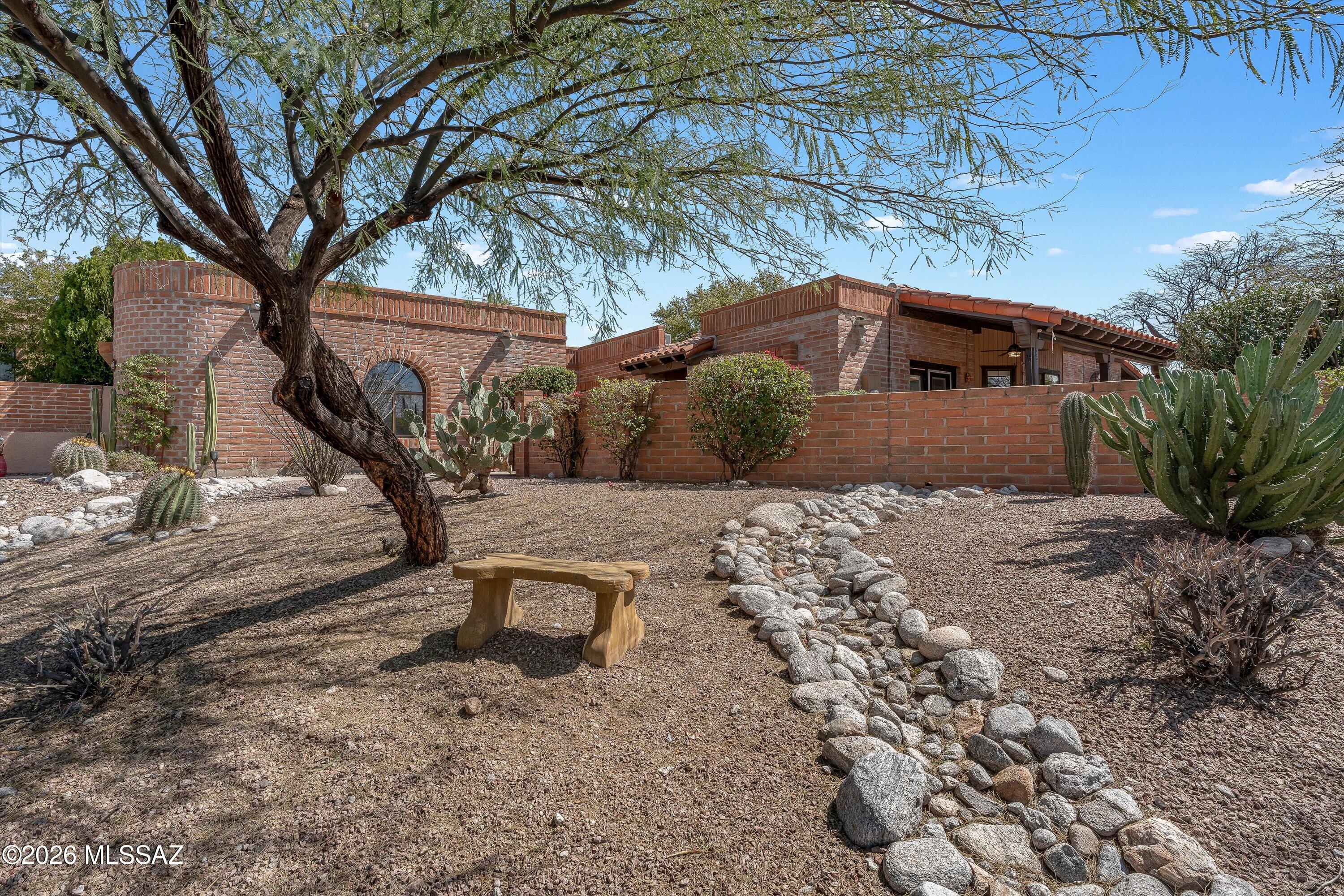 Enjoy mountain, city & sunset views. Nicely updated kitchen w/newer cabinets. See through kitchen to living area. Primary bathroom remodeled with soaking tub and glass walled shower. Covered side and back patio with sliding doors leading from kitchen to side patio. Enjoy the great outdoors of Tucson living. Welcome home to Fairfield in the Foothills. Water heater 2022, hvac 2021. Community offers 2 pools, spas, tennis/pickleball courts, & bocce ball. Close to shopping, restaurants, hiking and more.