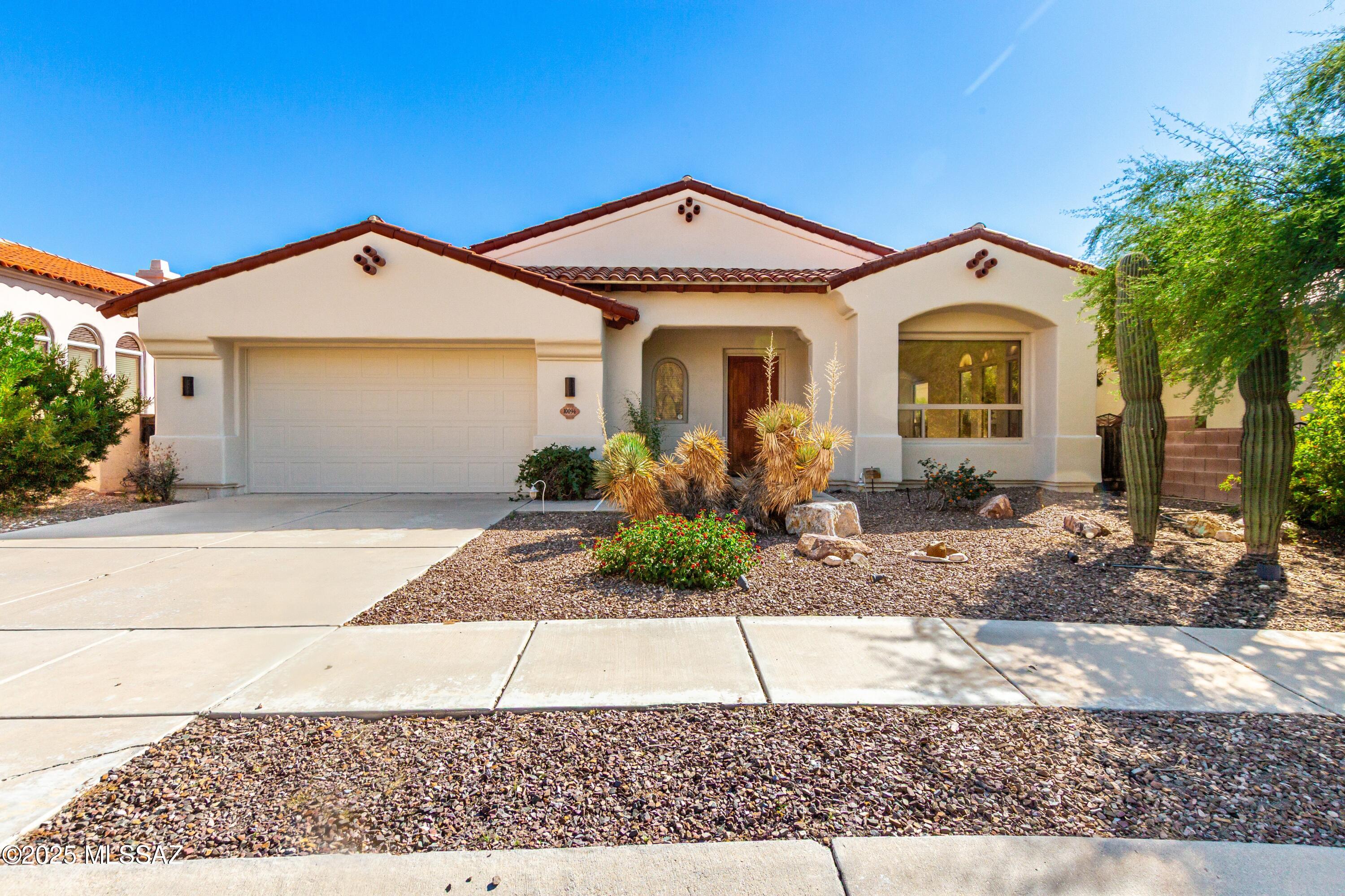 Located in one of Tucson's exclusive 24/7 guarded & gated communities, this home has a brand new HVAC system and is the best deal in the neighborhood, hands down, with sellers offering up to $25k in concessions. Soaring vaulted ceilings, dramatic archways, and natural light throughout create a bright, airy atmosphere in this beautiful space. The home features multiple bedroom en-suites, offering privacy and luxury for family or guests, and an additional room as a bedroom/den/office. Step outside and relax in the backyard oasis with an exposed wood beam patio and a perfectly sized spool flanked by desert landscaping. Last but not least, residents enjoy resort-caliber amenities including security, a sparkling community pool, elegant clubhouse, and access to Arizona National Golf Club
