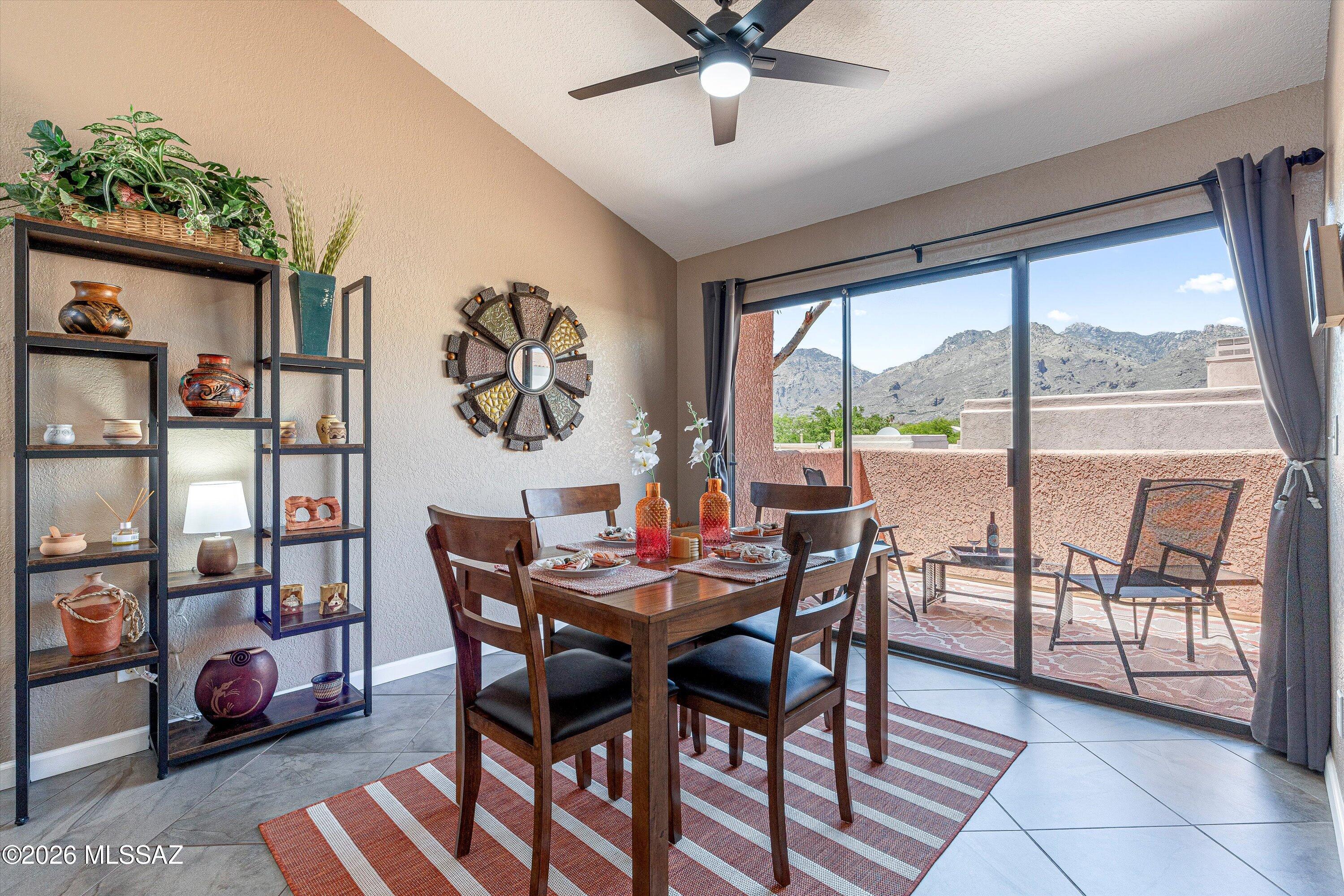 Seller will accept offers between $310,000 and $320,000. Enjoy resort-style living in Tucson Catalina Foothills. Pristine, fully furnished 2nd floor turnkey condo featuring open-concept living & dining area w/vaulted ceilings, a fireplace, & two separate viewing balconies. Enjoy easy indoor-outdoor flow w/ Mtn & sunset VIEWS. Updated kitchen, in-unit washer/dryer, & fully furnished setup make the home ready for seasonal or year-round use. Both bedrooms include adjustable king beds. New HVAC units May 2025 have 10-year transferable warranty. Gated Community. HOA coverage includes water, roof, exterior, landscaping, pool, rec room, tennis court, pickleball, 2 spas. Catalina Foothills School District. Near shopping & restaurants. Plus, just 1 mile from Sabino Canyon Rec Area. Welcome Home!