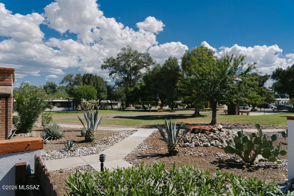 Welcome to this well-maintained 588-square-foot, one-bedroom villa in the desirable Villas West community. This Villa offers the perfect location and has a sizeable east-facing patio with beautiful views of grass and mature trees. As you step inside you will notice the tile floor that flows throughout the whole Villa.  You will appreciate the open kitchen with white cabinets, a full-size gas range, a pantry closet, and all stainless-steel appliances. Villas West is centrally located and close to restaurants and shopping. Additional improvements include an upgraded electrical panel and upgraded dual-pane windows, providing added efficiency and peace of mind. The monthly HOA fee covers the HVAC, roof, exterior paint, water heater, trash pickup, sewer, water bill, community pool, and much more. Why rent this year when you can have your own winter getaway.