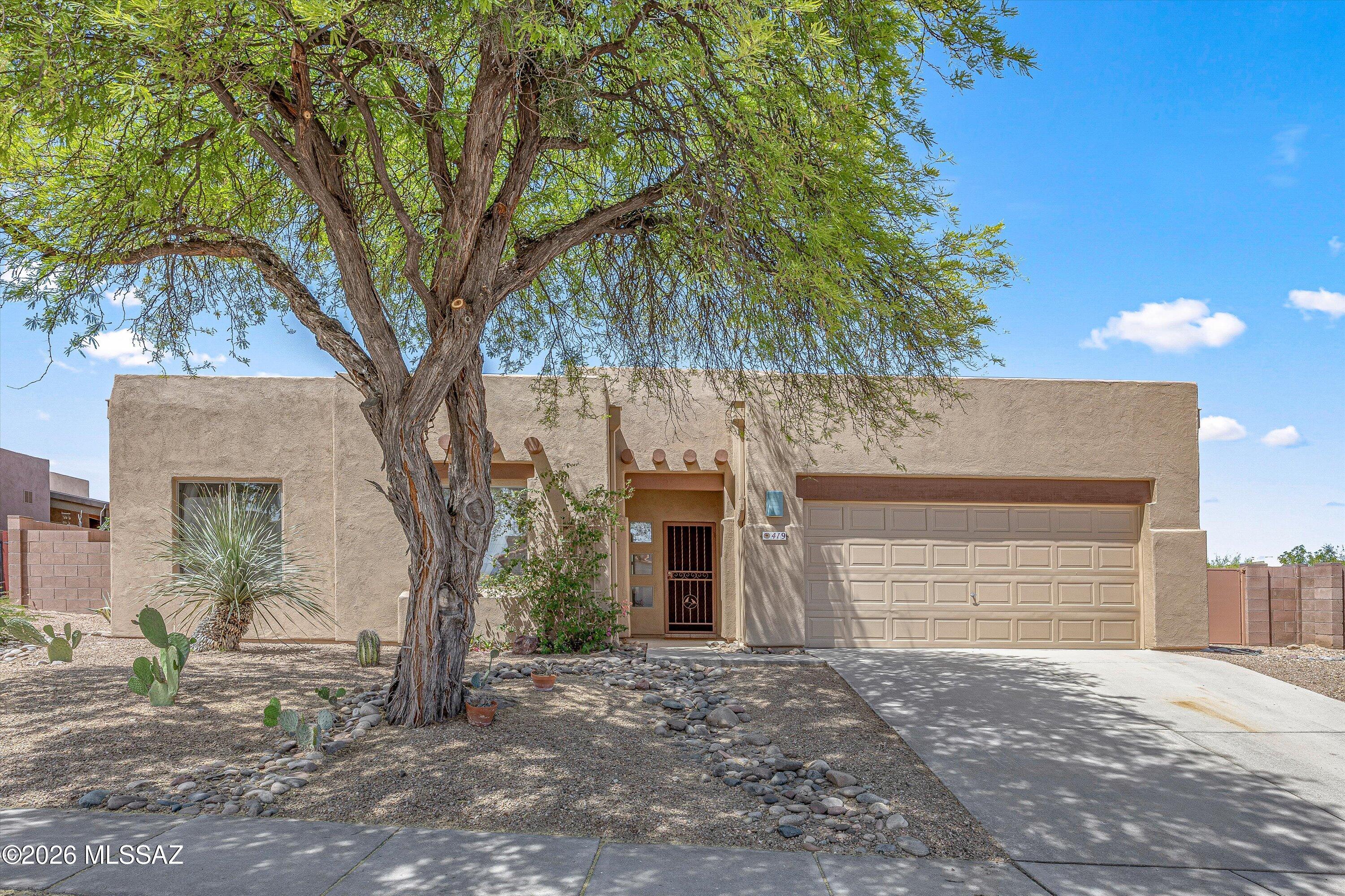 1-story home in desirable Casa De Coronado cul-de-sac with spacious great room floor plan ideal for entertaining. This 3 bed, 2 bath + den features custom office spaces with Murphy beds in 2 rooms, huge primary suite, stainless steel appliances, & oversized 2+ car garage w/ epoxy floors, workshop space, and dedicated 50Amp EV wiring. Enjoy a private backyard with raised rear wall, newer Pebble Tec pool with energy-efficient pump, custom shade sail, mountain views, large covered patio, and turf area. Recent updates include new exterior paint, roof just serviced, LED recessed lighting, & some interior paint. Nearly quarter-acre lot w/ natural area behind. Close to Sabino Canyon, Mt Lemon, hiking, biking, shopping, dining, & movie theater within a mile. Also HOA is only $150/year