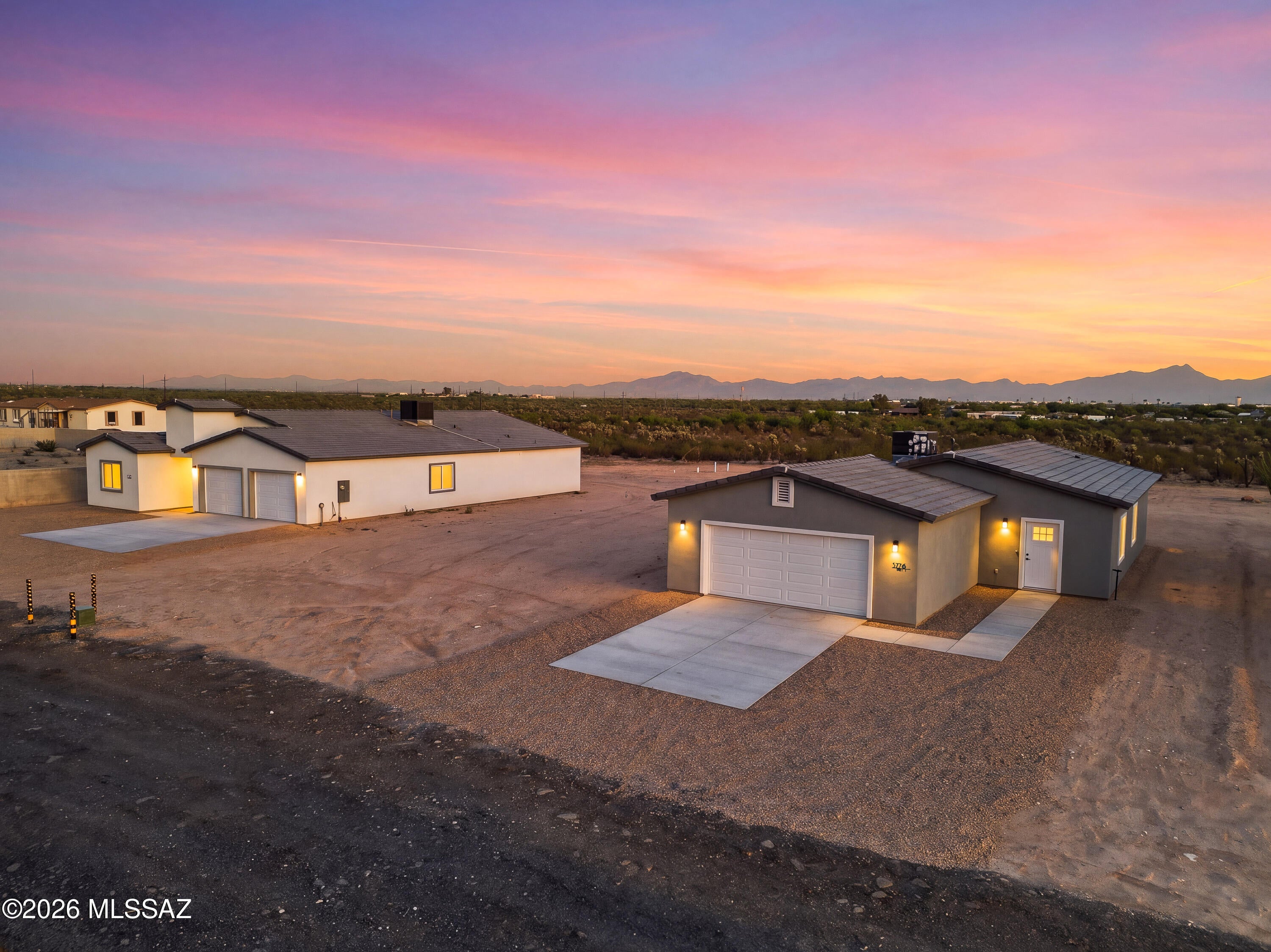 New Construction | Two Detached Residences with Garages | 1 Acre | No HOA

$680K-$700K Range Pricing | A unique offering featuring two beautifully designed new-construction residences on one expansive 1-acre homesite with no HOA. Designed for flexibility, this property is ideal for multigenerational living, extended family, long-term guests, or the opportunity to generate rental income from the second residence, all while maintaining privacy and independence between both homes.

Conveniently located approximately 5 minutes from I-10, with easy access to Tucson International Airport and Tucson Spectrum, offering major shopping, dining, entertainment, and everyday conveniences nearby.

The main residence offers 2,358 square feet with 5 bedrooms and 2.5 bathrooms, featuring elegant finishes, an open-concept design, generous living spaces, and the comfort of modern construction. The second detached residence offers an additional 1,320 square feet with 3 bedrooms and 2 bathrooms, providing a complete and private living space of its own.

Each residence features its own 2-car garage, offering a level of space and functionality rarely found in a single property. Set on a full acre, the property offers abundant outdoor space with the flexibility to create a setting that fits your lifestyle.

With no HOA, two detached residences, four total garage spaces, and approximately 3,678 square feet of combined living space, this is a rare opportunity to enjoy space, versatility, and modern living, all on one property.