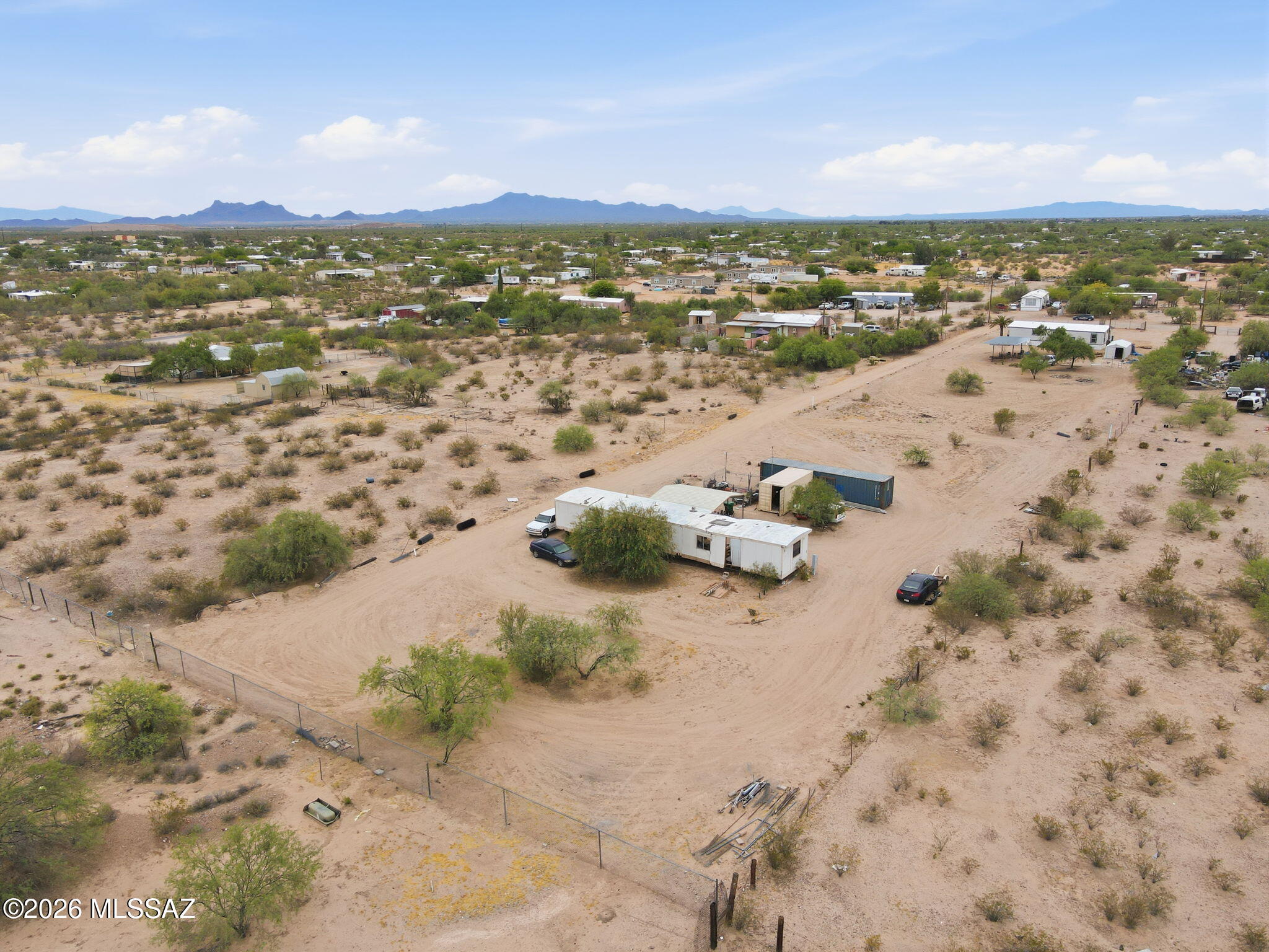 1 ACRE WITH UTILITIES ALREADY IN PLACE -- READY FOR YOUR NEXT HOME.

Located in Marana, just about 20 minutes from the freeway, this 1-acre parcel offers privacy, convenience, and flexibility. Situated toward the back as the dominant parcel, the property includes an easement for access and a gated entry for added security.

Septic tank and water are already on site, saving time and development costs. A manufactured home currently sits on the property and will convey, but the property is being sold for land value only.

Surrounded by other manufactured and site-built homes, this is a great opportunity to place a new manufactured home or build for the future. Enjoy peaceful desert living while still being close to town and amenities.