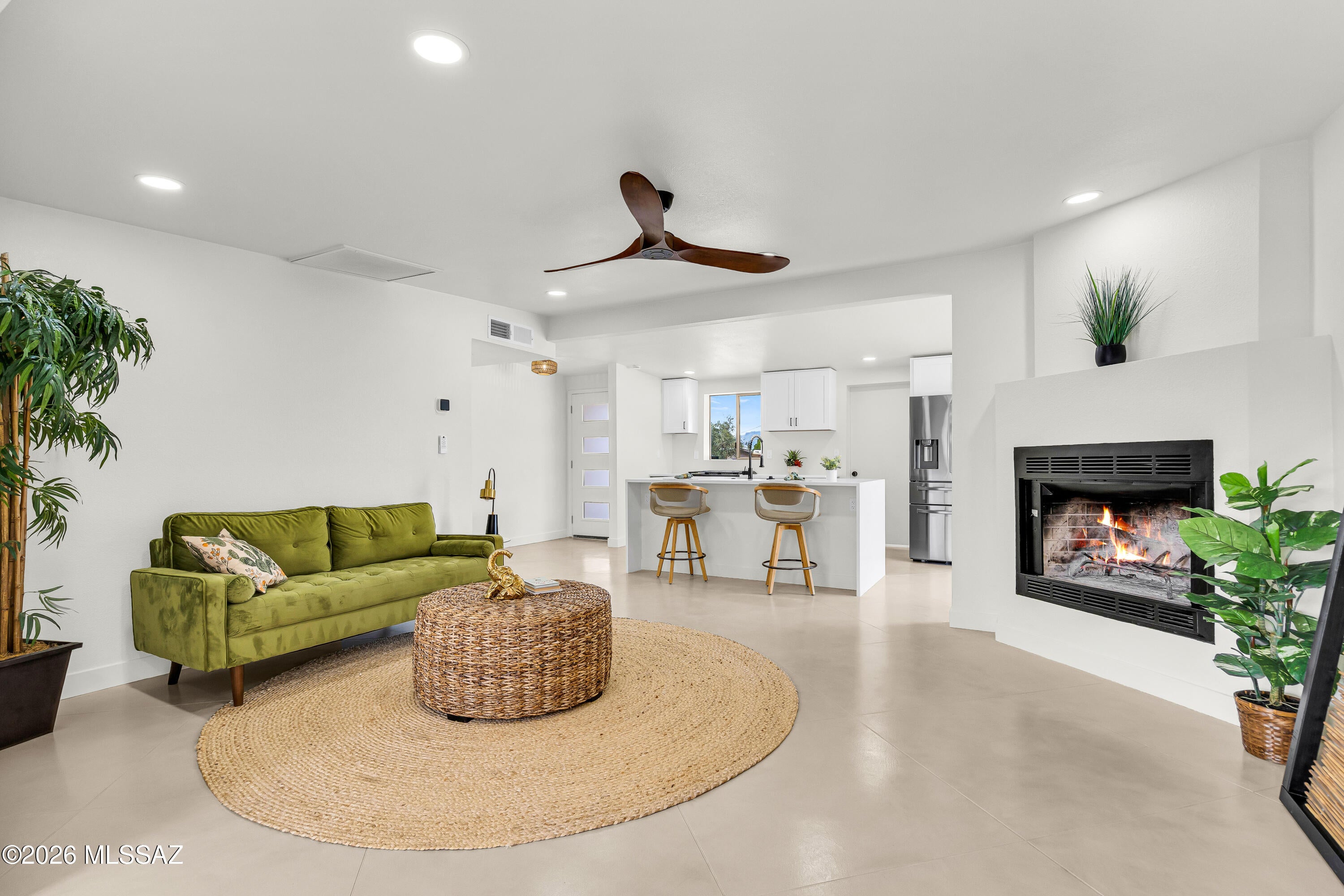 Beautifully reimagined, this fully redesigned 3bed/2bath Tucson home features many upgrades including waterfall island, quartz countertops, concrete overlay floors, beautifully finished walk-in primary shower, tankless water heater, and much more. Nearly every part of this home has been updated, creating a clean, modern, move-in-ready space. The roof has been repaired and recoated and includes a transferable warranty. Outside, enjoy a large yard, two-car garage, fully re-plastered/tiled pool AND hot tub,  and a new spa heater. Recent pool and spa improvements also include a transferable warranty. Full panel electric upgrade. For added peace of mind, Seller will provide Buyer with a one-year home warranty of their choice at closing.
Seller is licensed to sell real estate in Arizona.