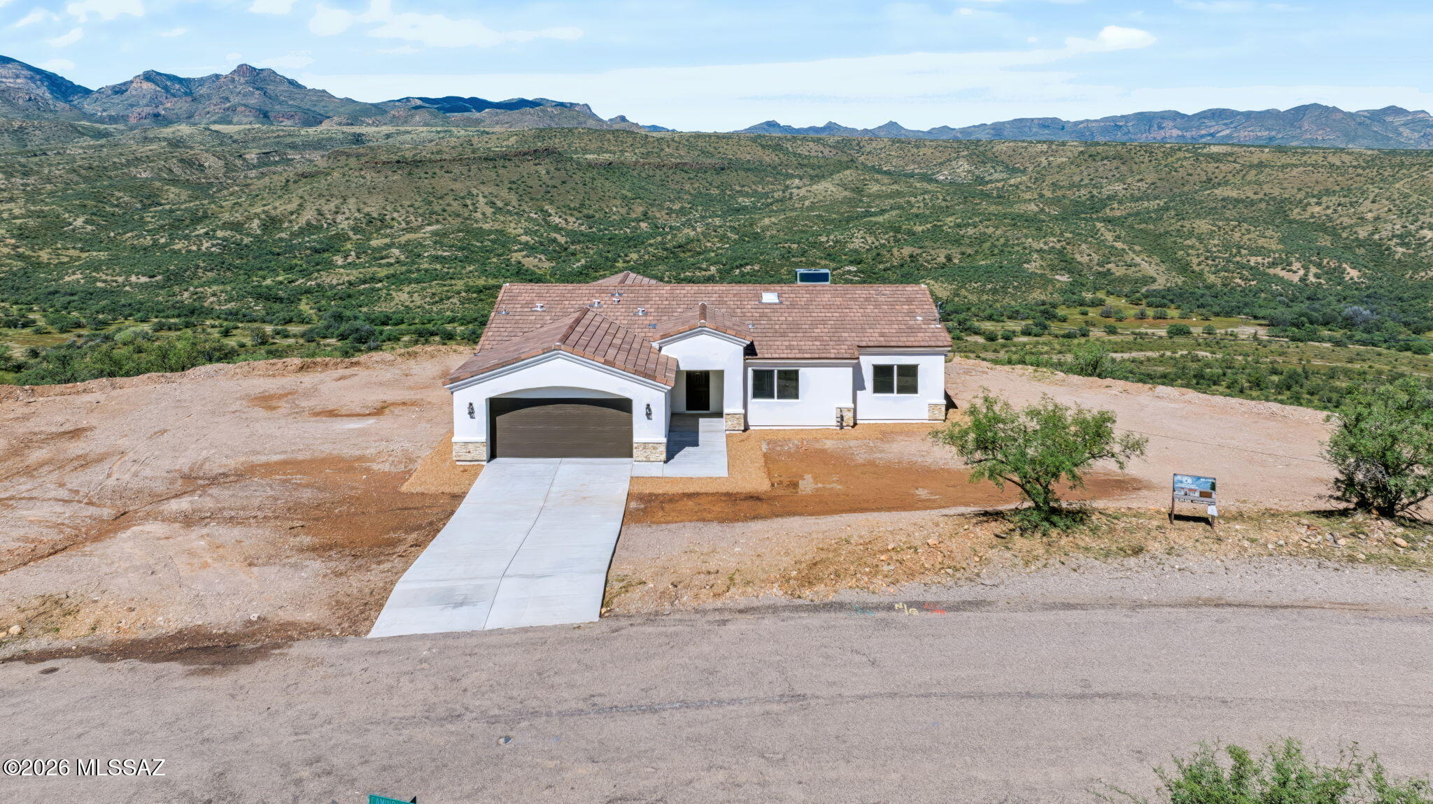 Beautiful brand-new 4-bedroom, 2-bath home situated on 2.98 acres with stunning panoramic views of the Rio Rico mountains. Enjoy the peaceful beauty of Southern Arizona from this spacious property, offering plenty of room, privacy, and breathtaking scenery. A wonderful opportunity to own a new home surrounded by natural beauty and mountain views.