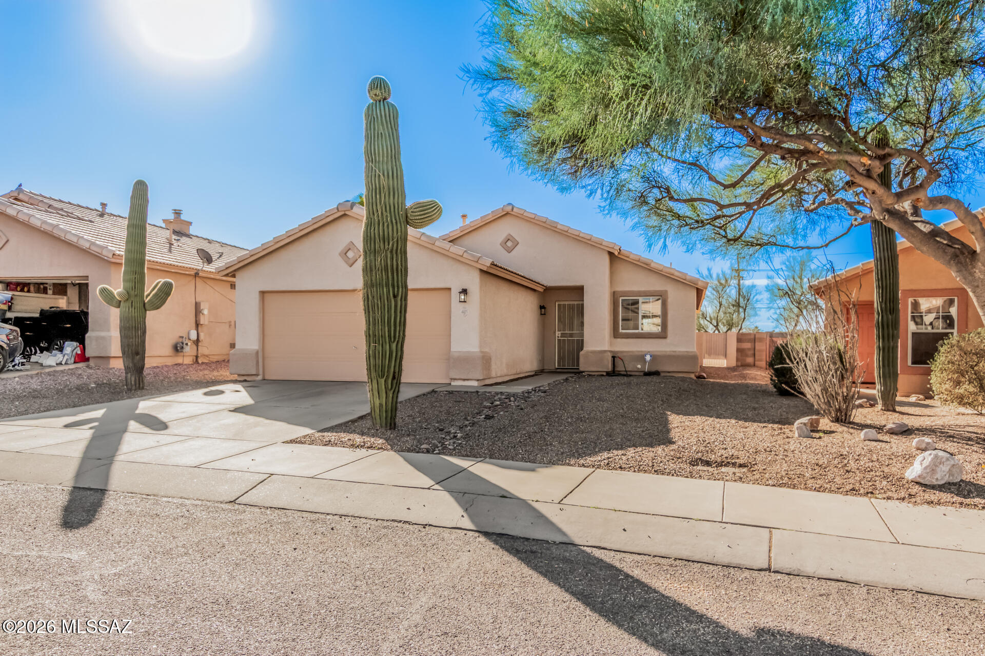Improved price + major upgrade = unmatched value! This beautifully updated 3BD/2BA home is move-in ready and priced to sell in a highly desirable area. Fresh interior paint and new luxury vinyl plank flooring throughout. Open great room design flows into kitchen and dining for easy everyday living. Split-bedroom floor plan offers privacy, with a spacious primary suite featuring walk-in closet and private bath. Oversized backyard with no neighbors behind, mountain views, and basketball court--rare at this price point. Seller to replace tiled roof prior to close of escrow. Act quickly--opportunities like this don't last!