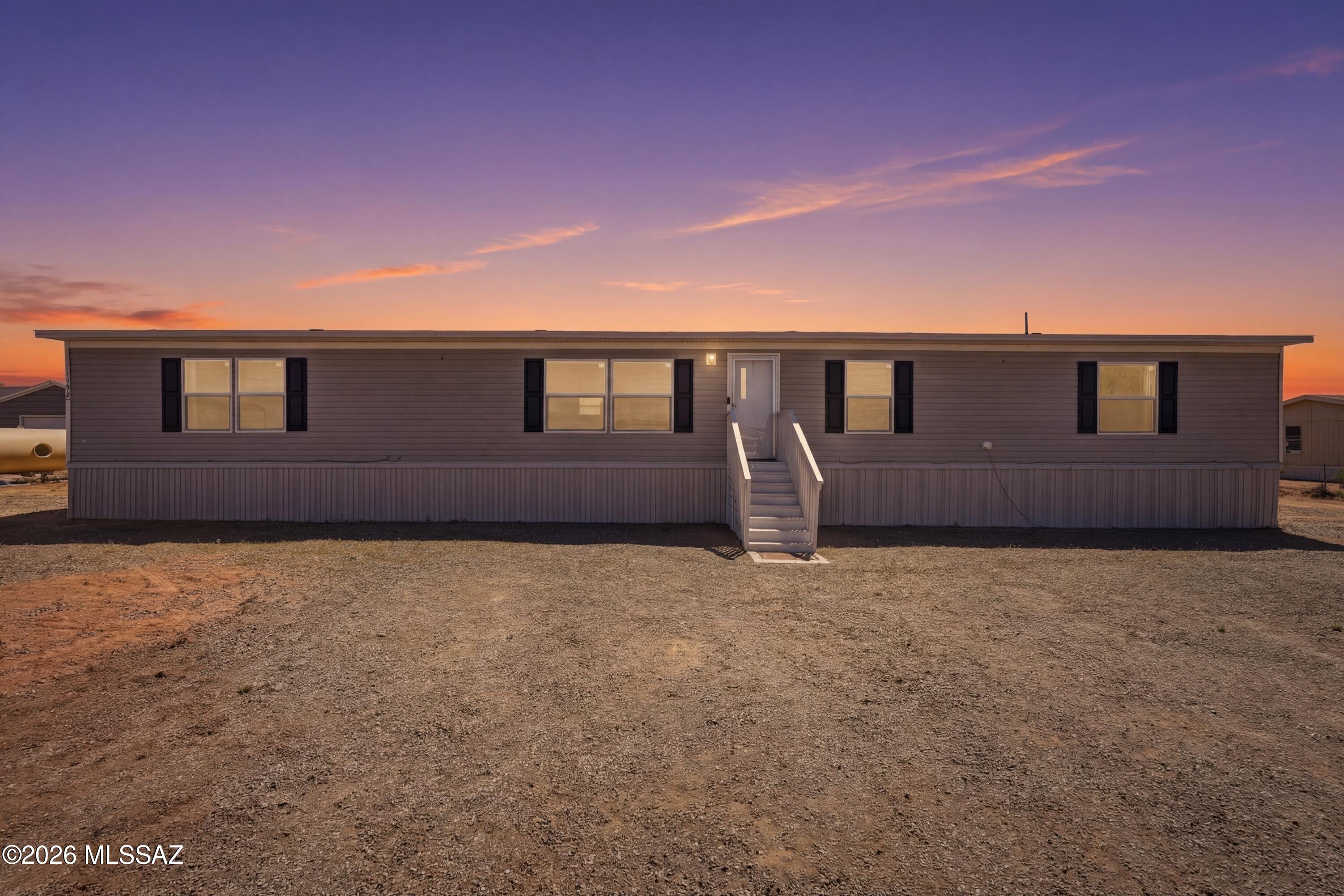 This 2021-built home sits on a full 1-acre lot in Picture Rocks, offering 5 bedrooms, 3 bathrooms, and over 2,100 sq ft of flexible living space. Enjoy wide-open desert views, no HOA, and a fenced yard with room for toys, trailers, pets, or future plans.

Clean, well-maintained, and move-in ready, this home delivers a rare opportunity to own a newer built manufactured home with land at an affordable price.

Located near
Saguaro National Park West
Picture Rocks Park
with convenient access to local amenities, schools, and I-10--this is the perfect blend of privacy and practicality.

Come experience the space and lifestyle Picture Rocks is known for.