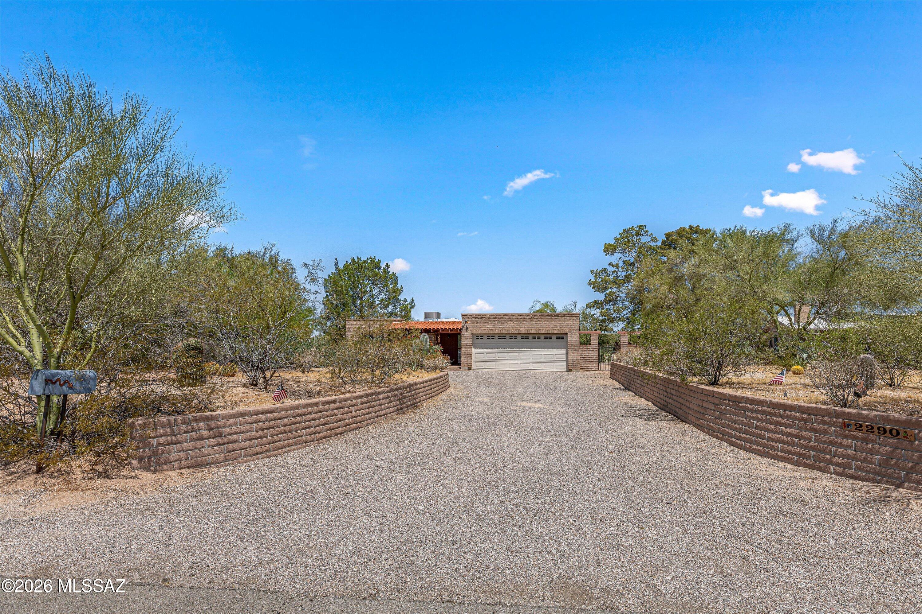 Rare Opportunity in sought after Casa Adobe's West. This unique home offers 1585 ft.² on over half an acre lot with no HOA and room to add a guest house, Casita, or additional structure. Beautiful stone floors flow through-out the home, complimented by a warm beehive, woodburning fireplace and an inviting wraparound patio perfect for enjoying the peaceful desert setting. The updated kitchen and bathrooms feature granite countertops, blending timeless character with modern touches. Major improvements include a new roof installed in 2023 and a brand new water heater installed May 2026 tucked away in a secluded setting yet conveniently located near shopping, dining and schools. This is a rare Casa Adobe's home with space, privacy, and endless potential.