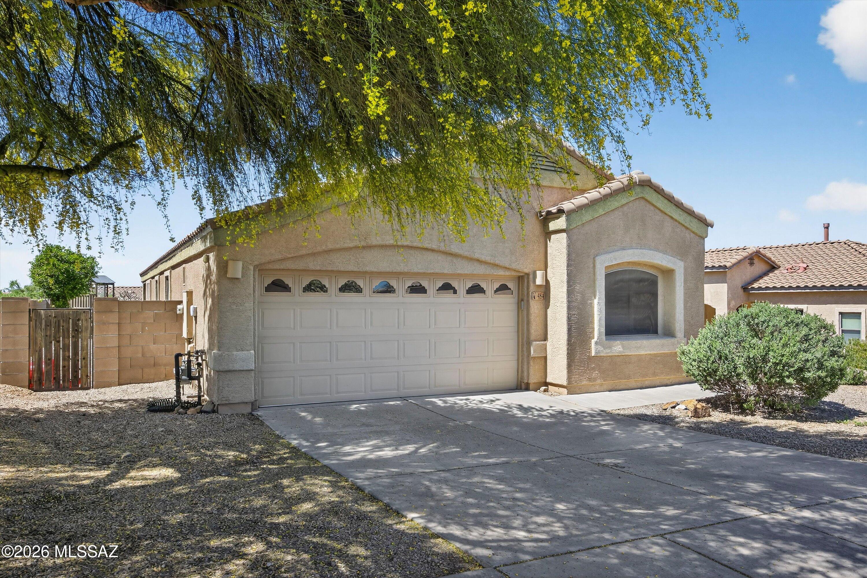 Fantastic 3 bedroom, 2 bath home in Corona de Tucson. Sellers have loved their yard- backyard has fruit trees (plum & lemon), turf, large side yards that make great dog runs! Front yard landscaping, interior newer wood-look plank tile, open concept floor plan with great natural light. Newer stainless appliances, gas range, large pantry tons of counter space and large hightop island in kitchen. This house has been well maintained and is ready for its new owner! Great neighborhood with community playground, minimal HOA fees, and Vail School District! Mountain views and great access to hiking and recreation, schools and more. Sellers know the new owners will love it and will offer a home warranty with good offer! Call listing agent to schedule an easy showing.