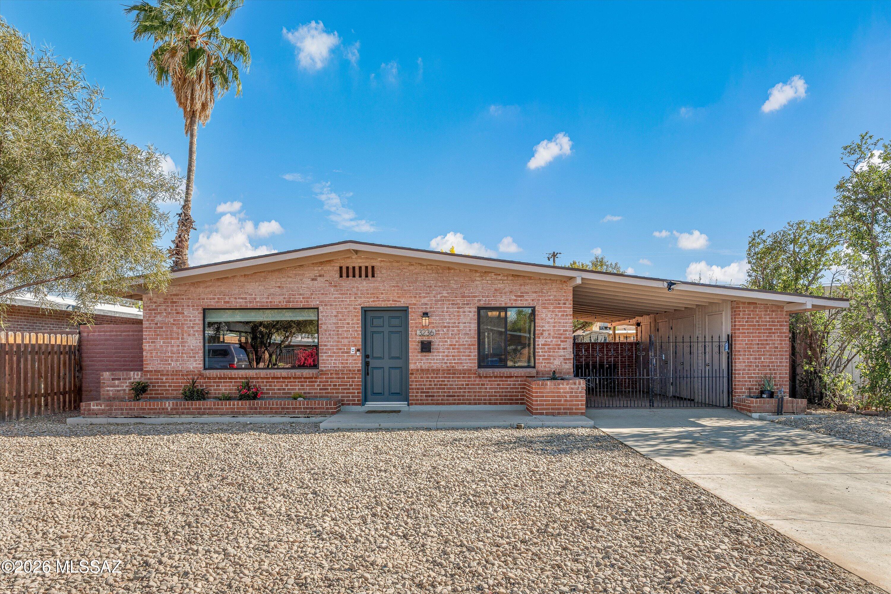 Located in the heart of central Tucson, this beautifully updated home offers the perfect blend of comfort, convenience, and lifestyle. Just moments from Whole Foods Market, the popular La Rosa venue, charming coffee shops, local restaurants, Himmel Park, and conveniently situated close to the bike route on 3rd St.
The home has been thoughtfully maintained and updated, featuring new flooring throughout, two new entry doors, and fresh interior paint that creates a bright, clean feel from the moment you walk in. Newer Milgard windows are installed throughout the home, with brand-new windows in the Arizona Room - all under warranty. The enclosed Arizona room, complete with its own air conditioning, offers flexible space perfect for a home office, gym, art studio, or creative retreat. Other recent improvements add even more value and peace of mind, including a main water line upgraded from galvanized to copper from the house to the street, a roof that is under warranty (approximately four years old), HVAC service completed last month, new lighting inside and out and a new microwave and washing machine.
The large, private backyard provides plenty of space for entertaining, gardening, or even possibly an ADU or casita (Buyer to verify). Practical features make everyday living easy, including covered parking to keep your vehicles protected from the Arizona sun and multiple storage closets in the carport area.
A rare opportunity to own a move-in-ready home in a highly desirable central Tucson location close to parks, dining, and everyday conveniences.