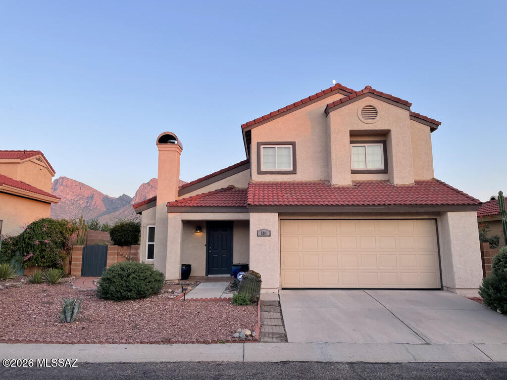 VIEWS! VIEWS! VIEWS! Fantastic home in small enclave of homes within walking distance to Riverfront Park. Home backs up into an open wash with unobstructed views of Pusch Ridge! HVAC system installed in 2021. Entire home re-plumbed so NO MORE POLY! Water Heater from 2023! All bathrooms beautifully upgraded! Kitchen has a custom drop in sink.  Upgraded blinds.  Newer windows! Community has a pool located very close to home. Incredible opportunity to be in OV close to everything!