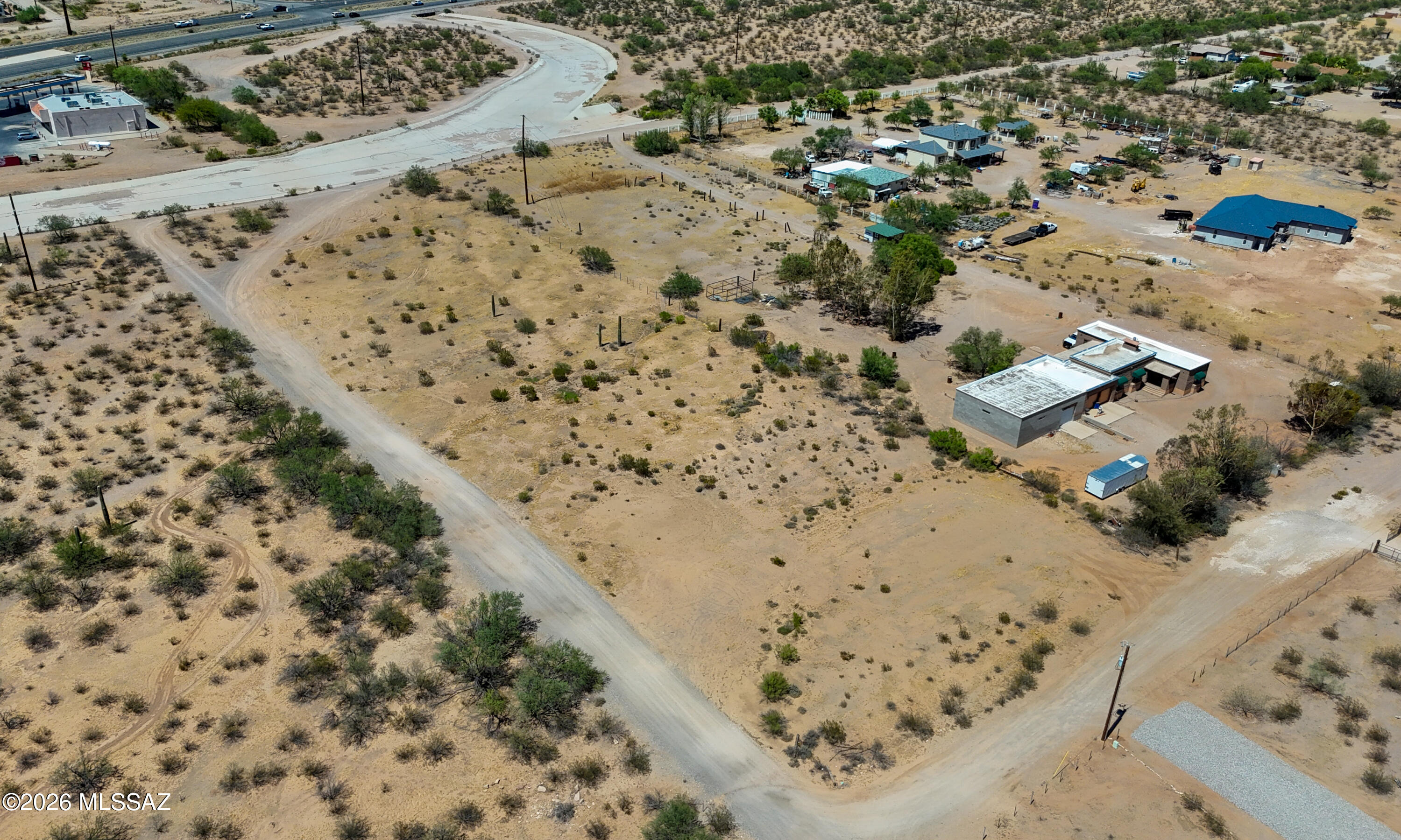 Build your dream home on this exceptional 2.92-acre corner lot, ideally located just south of Ajo Highway and east of Camino Verde. This expansive, flat parcel offers endless possibilities and is surrounded by beautiful custom homes, creating the perfect setting for your future residence. The property features electric service, access to a shared well, and partial fencing, providing added convenience and value. Enjoy breathtaking mountain views, wide-open skies, and the peaceful atmosphere of country living while remaining just a short drive from city amenities. Don't miss this rare opportunity to own a premium homesite in a highly desirable area!