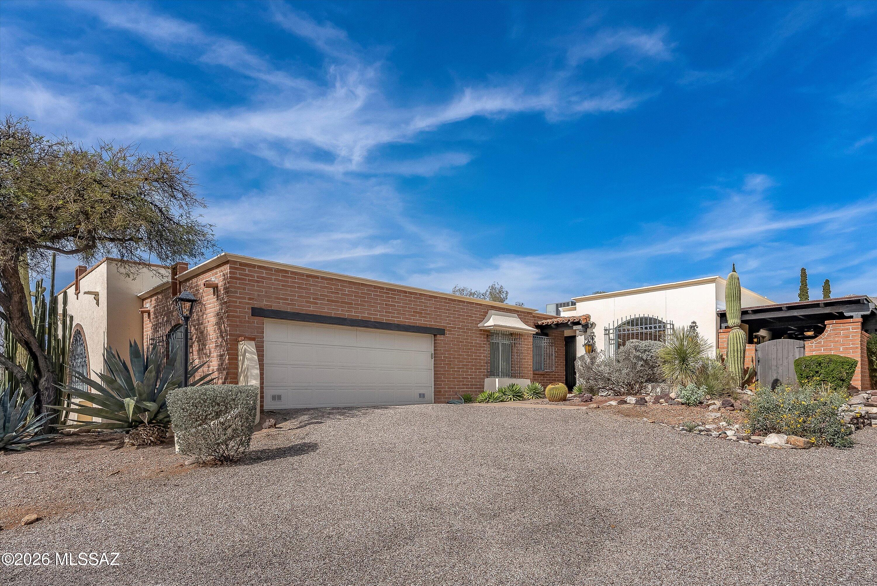 Located in the highly desirable Catalina Pueblo community in the heart of the Catalina Foothills, this well-maintained residence offers timeless Southwestern charm and comfortable living. The home features 3 bedrooms and 2 bathrooms with a functional, open layout filled with natural light.

The kitchen is equipped with all new appliances, ample cabinetry, and an eat-in dining area that flows seamlessly into the main living space--ideal for everyday living and entertaining. Spacious living and dining areas open to a private brick paver patio, perfect for enjoying Tucson's indoor-outdoor lifestyle.

Additional highlights include a primary suite with ensuite bath, generous storage, and an attached 2-car garage. Catalina Pueblo offers multiple community pools, walking paths, and beautifull landscaped grounds, all within close proximity to La Encantada shopping, dining, hiking trails, and top Catalina Foothills amenities.

A prime opportunity to lease in one of Tucson's most sought-after communities.