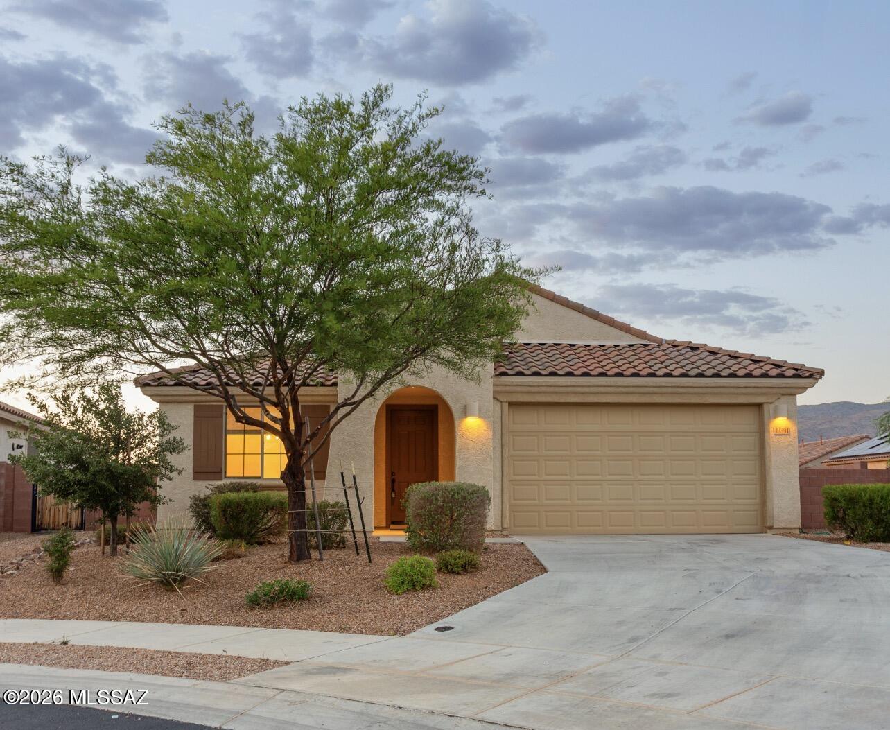 SELLER OFFERING UP TO 3% CONCESSIONS TOWARDS BUYERS CLOSING COSTS/RATE BUY DOWN. MOUNTAIN VIEWS on a 10,973 square foot lot. Pulte built home with many design studio upgrades including gourmet kitchen with upgraded extended cabinets and granite countertops, wall mount oven and microwave, gas cooktop stove, and stainless steel vent hood surrounded by tile backsplash. Wood plank tile in living areas and upgraded carpet in bedrooms. Luxury primary bath includes tiled walk in shower with rain fall shower and drying station. Versatile floor plan with split bedrooms and flex room/den. 2.5 car garage for extra storage. Large backyard with trees, shrubs and paver area for seating to enjoy mountain views. Homes also sits at the end of a cul-de -sac.   Located in Vail School District.