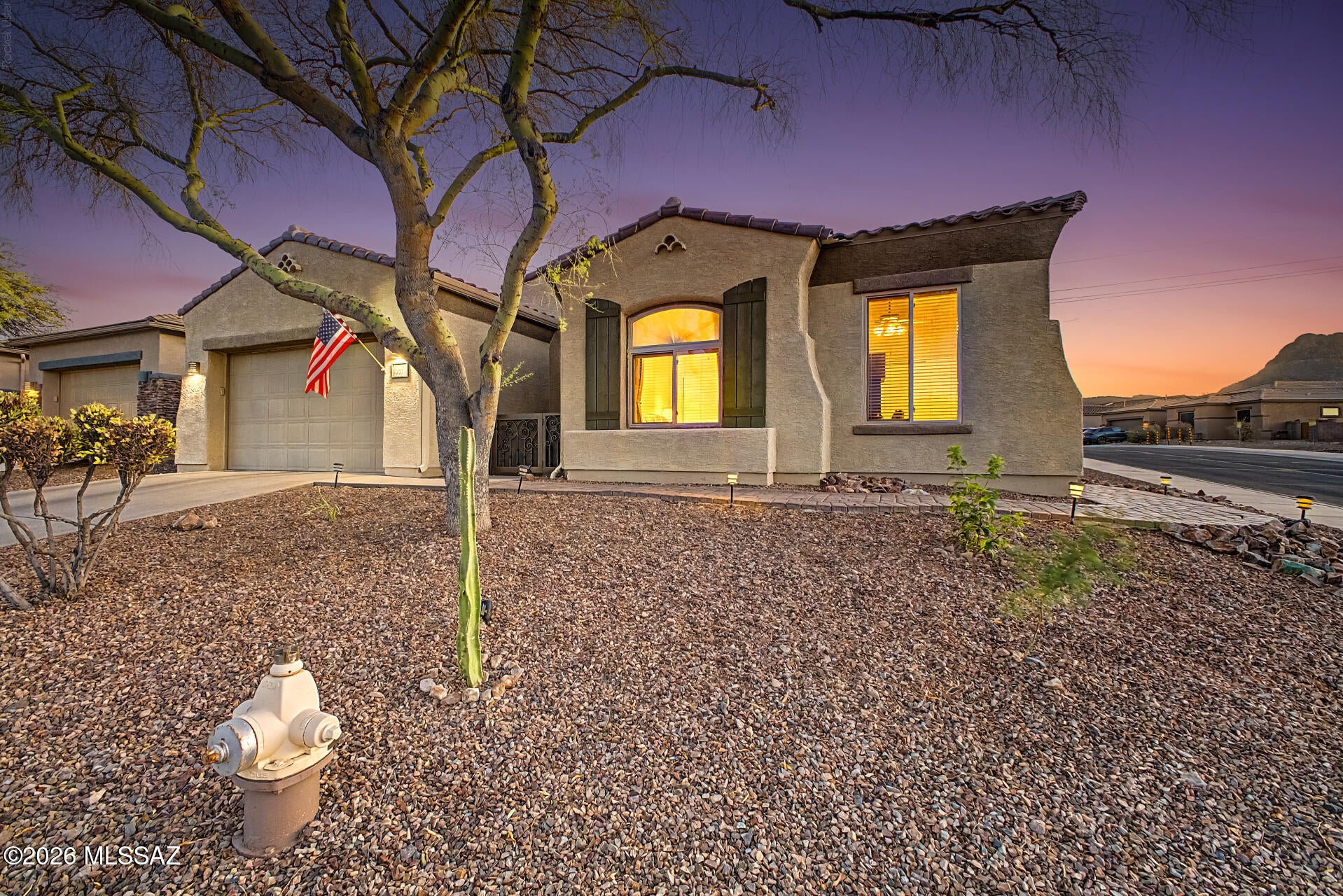 Your dream home is here! This charming corner-lot property welcomes you with a 2-car garage, well-laid pavers, and a mature Palo Verde tree. Step inside to an inviting living room featuring high ceilings, skylights for natural light, a soothing neutral palette, and a blend of soft carpeting and tile flooring. A dedicated family room offers additional space for relaxing evenings with loved ones. The well-appointed kitchen was remodeled in January and features quartz countertops, ample wood cabinetry, tile backsplash, stainless steel appliances, larger sink, under-cabinet lighting, and a two-tier peninsula with a breakfast bar. The primary suite offers a private bath, also remodeled in January, featuring quartz countertops, large marble tile, a spacious shower with a built-in bench, and an additional bench just outside the shower. Under-cabinet lighting adds an extra touch of convenience and style here too. All toilets throughout the home have also been replaced. Enjoy breathtaking sunsets in the backyard, complete with a covered patio, retractable shades throughout, a gazebo, a tranquil fountain, a built-in BBQ, and epoxy-coated flooring--perfect for entertaining. 

Other major updates include all new toilets and sinks in January 2026, a new water heater in 2025, all-new windows within the last three years, and an AC replaced in 2018. A water softener and whole-house filtration system provide added comfort and convenience. The assumable solar lease offers the potential to significantly offset monthly electric costs, with historical utility bills available for buyers to review. Don't miss the opportunity to make this beautifully updated home yours!