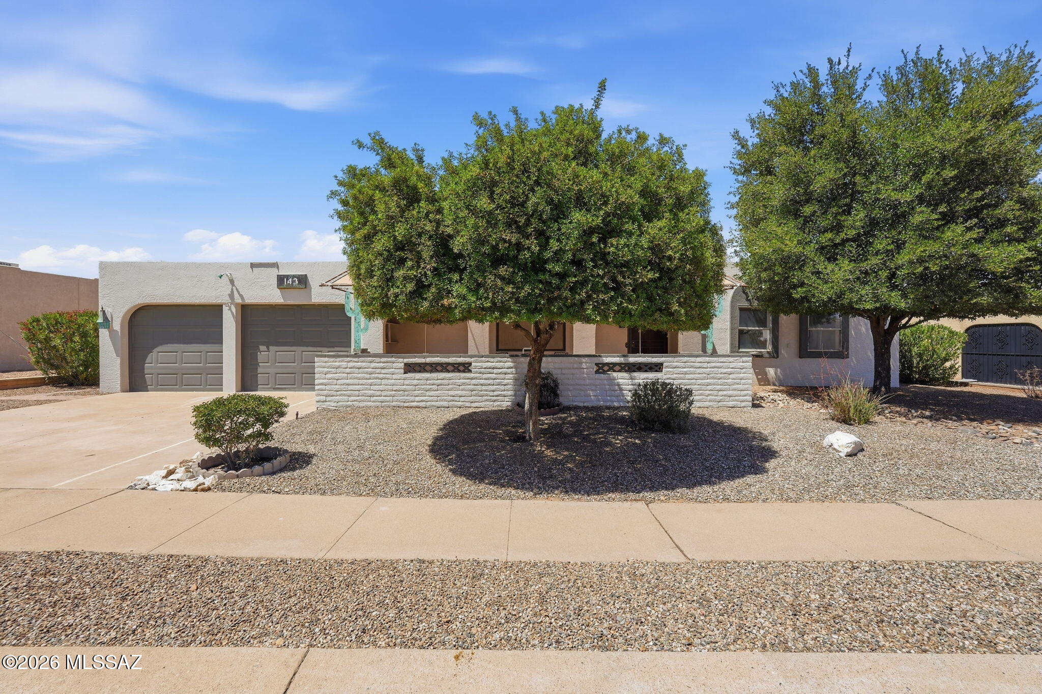 This inviting 2-bedroom, 2-bath home offers 1,646 square feet of comfortable living space, combining convenience, functionality, and easy Southwest living  in desirable Green Valley, located in a sought-after 55+ active adult community and close to several Green Valley Recreation centers. 
Inside, you'll find a spacious, light-filled floor plan with generous living and dining areas that are ideal for both everyday living and entertaining. The kitchen features all new appliances, ample cabinetry, and excellent workspace, creating a bright and functional center of the home. A dedicated craft room adds valuable flexibility for hobbies, projects, or a home office.
The primary suite provides a peaceful retreat with an en-suite bath and abundant closet space, while the second bedroom and full bath are perfect for guests. The 2-car garage adds convenience and extra storage. Enjoy Arizona's beautiful weather in the private outdoor space, ideal for relaxing with your morning coffee or winding down in the evening. Low-maintenance surroundings and a prime location near shopping, dining, golf, and recreation make this home an excellent choice for full-time or seasonal living.