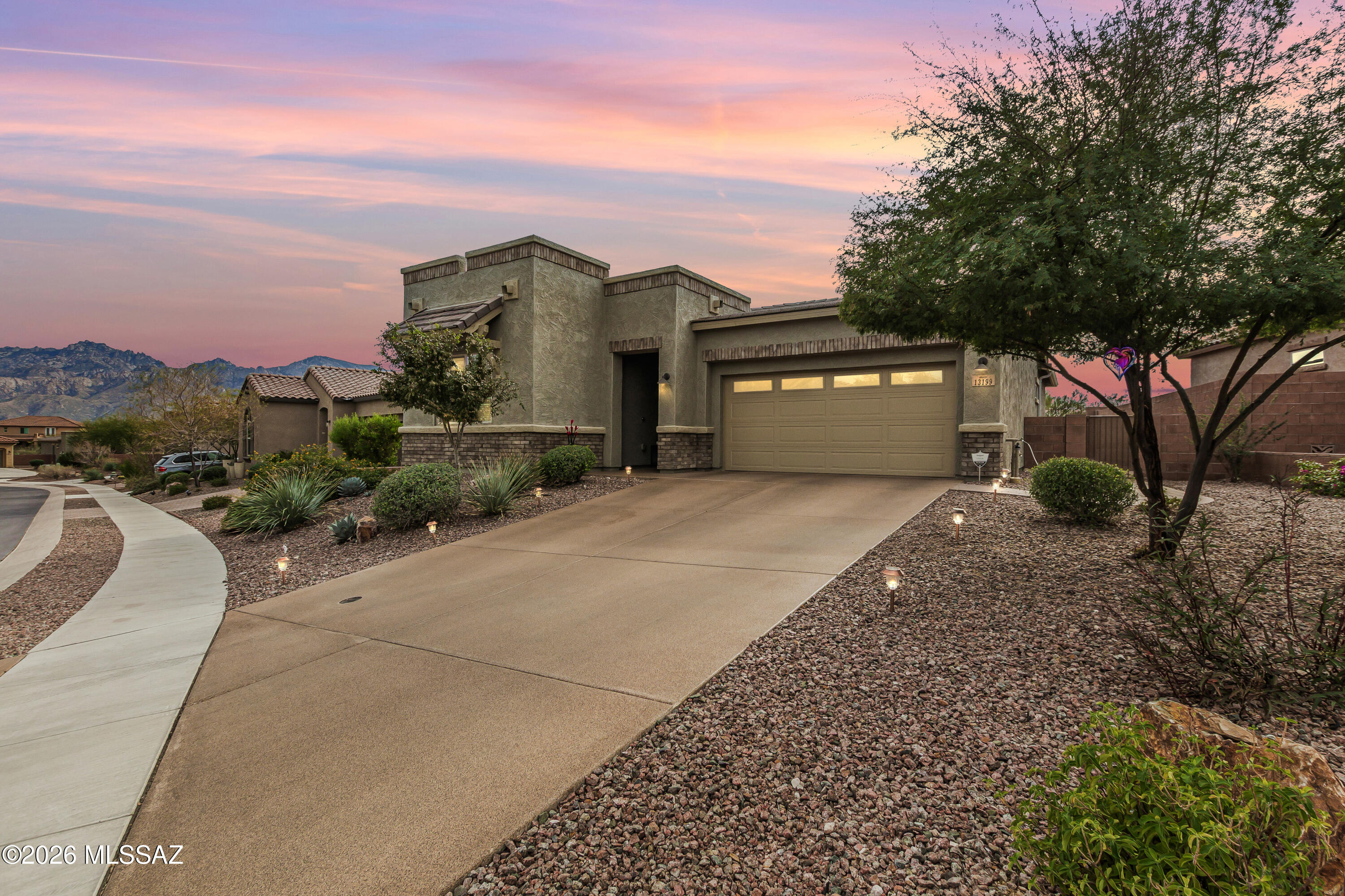 Home, sweet home! Don't miss the chance to own this beautifully maintained 2-bdrm 2Ba home w/state of art office,  Mtn views, Hot Tub  The inviting entry way leads to the gorgeous open floor plan, showcasing wood-look tile flooring, plantation shutters, crown moulding, & multi-sliding glass doors, creating a Great Room w/indoor-outdoor living. Gourmet kitchen is a cook's delight, fully equipped w/ ss appliances, a pantry, cabinetry, granite counters, recessed/pendant lighting, subway tile backsplash, & a prep island/breakfast bar. Discover an impeccable main retreat w/plush carpet, an ensuite w/two vanities, & a walk-in closet. This beautiful home w/security door & screens, covered patio w/sun shades, emergency generator, water softener Come Relax Unwind Enjoy Desert Living at its Best