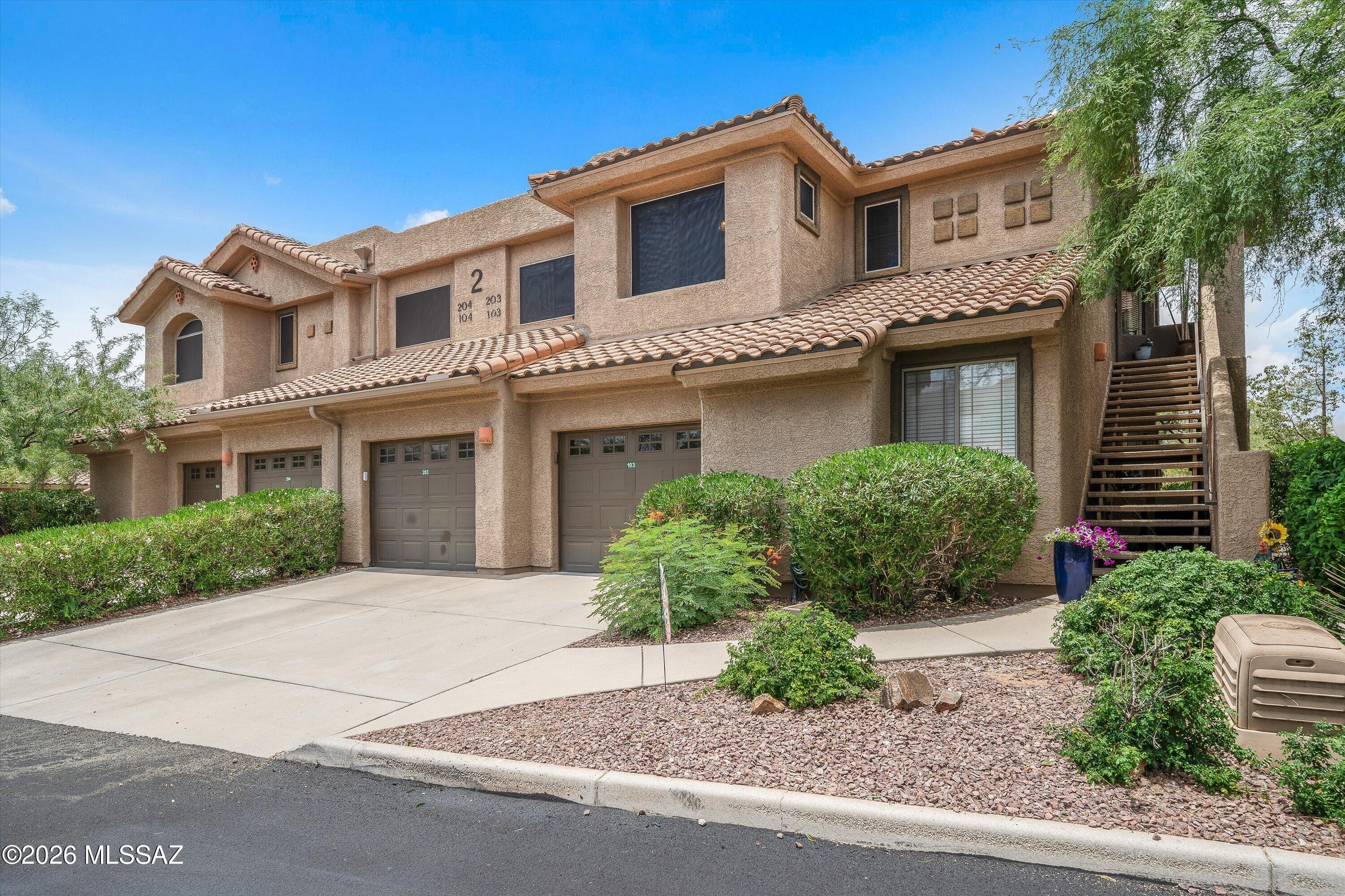 Vistoso Golf Casitas in Oro Valley - Bright & Cheerful 3BR / 2 BA 2nd Floor 1,445 sq ft Condo. with attached 1 Car Garage. Wonderful Open Floorplan. The Kitchen features New Stainless Appliances & Breakfast Bar and is Open to the Dining Area & XL Family Room that leads out to the Charming Covered Patio overlooking the Vistoso Trails Nature Preserve. Desirable Split Bedroom Floorplan. Large Owner's Suite w/ Walk-in Closet, Walk-in Shower & Dual Sink Vality. Enjoy the Resort Style Amenities: Pool, Spa, Fitness Ctr. Rec. Room & BBQ areas. New HVAC 2025. Excellent home or rental property that is convenienlty located to Shopping, Golf, Hiking Trails and Honey Bee Canyon, Restaurants, Medical & more. HOA Covers: Common Area, Exterior Maintenance, Roof (new), Exterior Paint, Trash, Pest & Water.